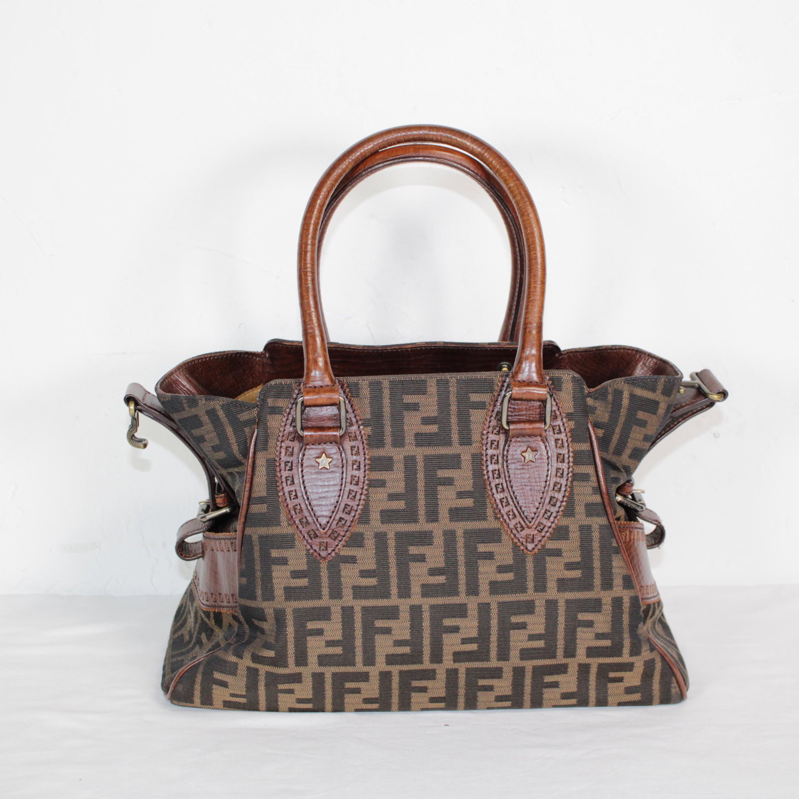 Fendi Etnico Tote in Large Zucca Canvas: Genuine Pre-Owned Fendi Etnico Tote in Dark Brown Large Zucca Canvas in A condition. Date Code is 2241-8BN157-TCX-078. Measurements: 32*34*13cm (Length * Height * Width). This lot includes a certifica