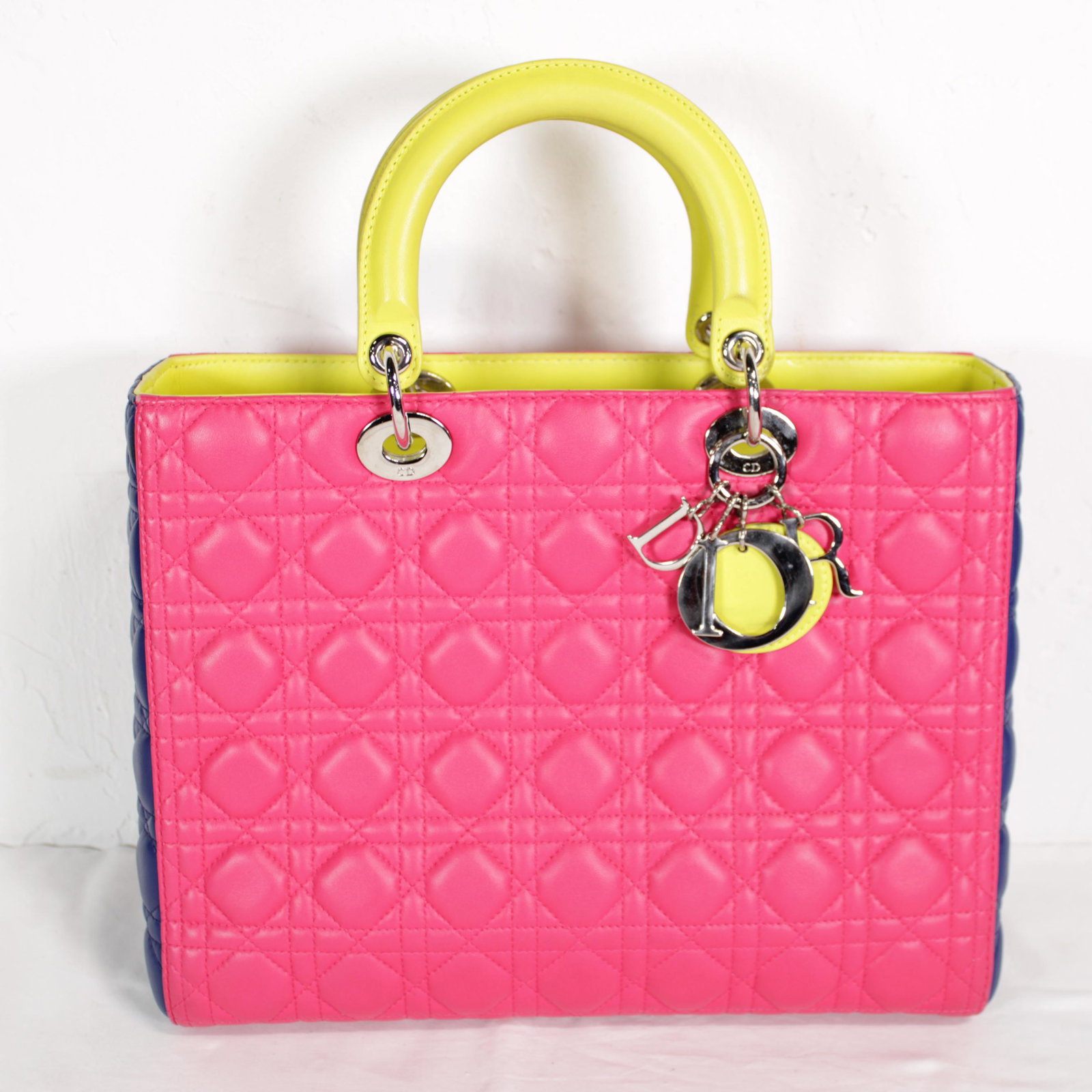 Dior Lady Tricolor GM in Cannage Leather: Genuine Pre-Owned Dior Lady Tricolor GM in Pink/Yellow/Dark Blue Cannage Leather in A condition. Date Code is 15-BO-1113 This lot includes Strap. Measurements: (Length * Height * Width). This lot incl