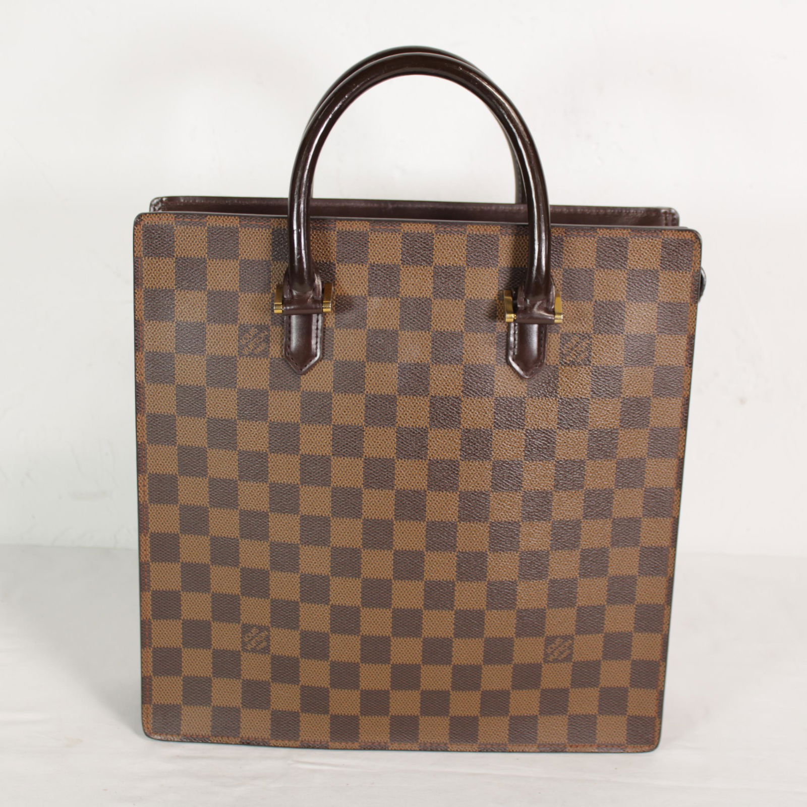 Louis Vuitton Venice PM in Damier Ebene: Genuine Pre-Owned Louis Vuitton Venice PM in Brown Damier Ebene in A condition. Date Code is MI0051. Measurements: 28,5*29,5*3,5cm (Length * Height * Width). This lot includes a certificate of authent