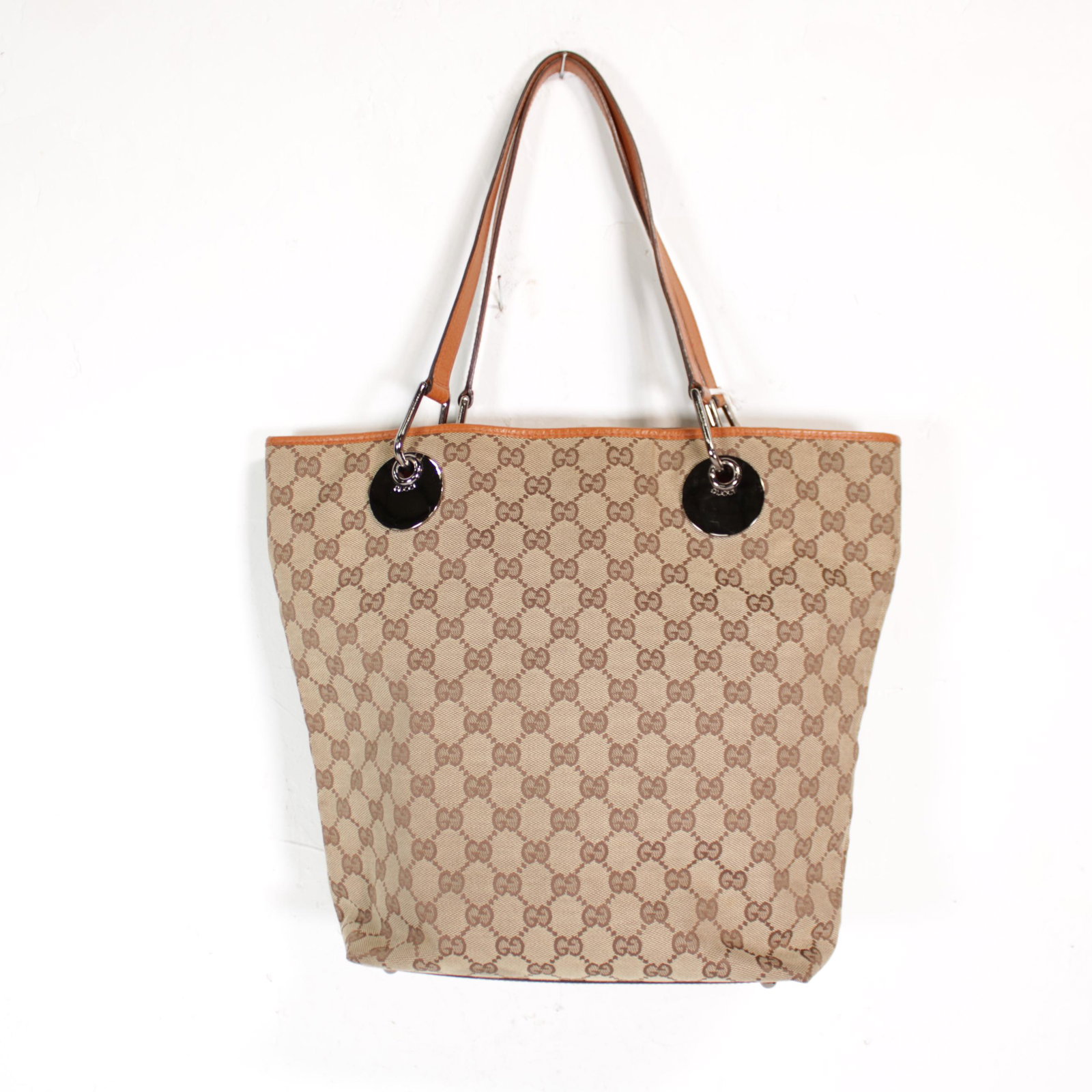 Gucci Eclipse Tall Tote in Monogrammed Canvas: Genuine Pre-Owned Gucci Eclipse Tall Tote in Brown/Beige Monogrammed Canvas in AB condition. Date Code is 120836/002058. Measurements: 24*30*11cm (Length * Height * Width). This lot includes a certifi