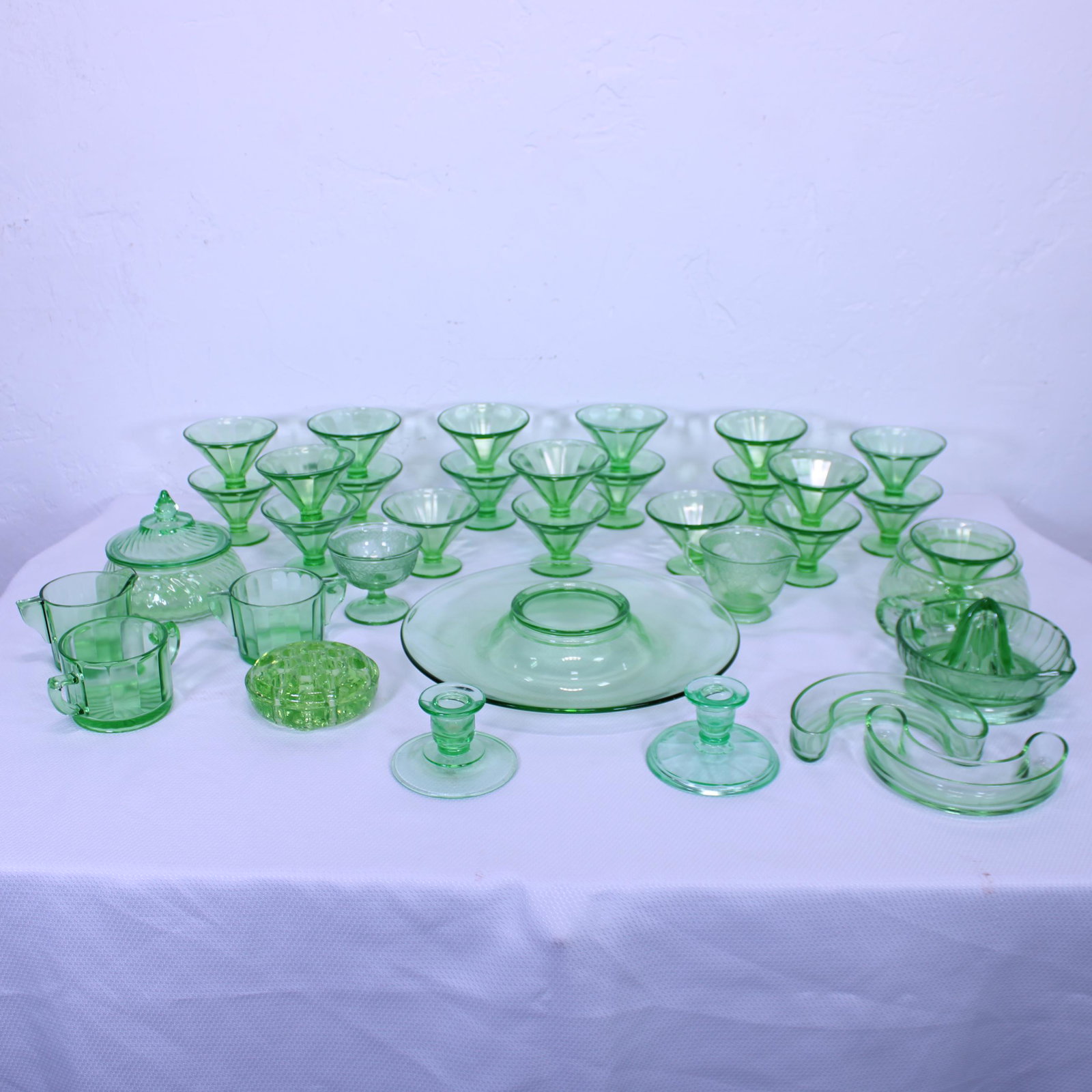 Collection of 34 pieces of Green Depression Glass: Collection of 34 pieces of Green Depression Glass - Center Bowl is 12 in round - tallest piece is 6 in tall x 7 x 7