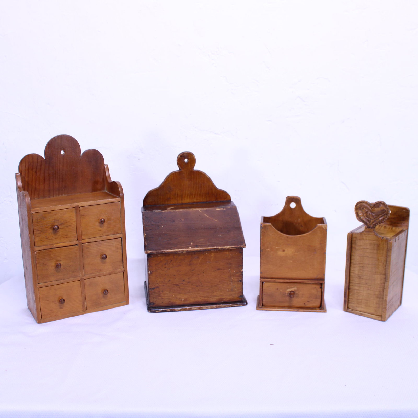 4 Small Hanging Wall Bins: 4 Small Hanging Wall Bins - 17 in tall x 9 x 5 (measurements for largest only)