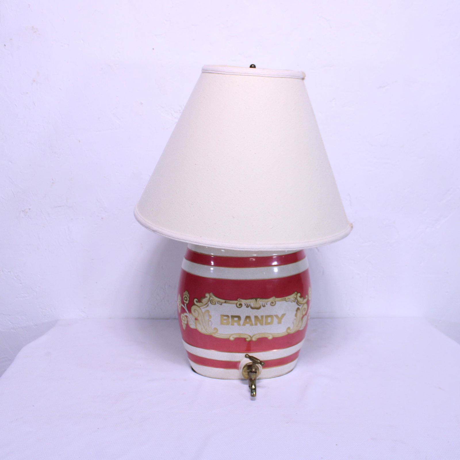 Antique Brandy Barrell Converted into a Lamp: Antique Brandy Barrell Converted into a Lamp - 29 in tall x 20 x 20