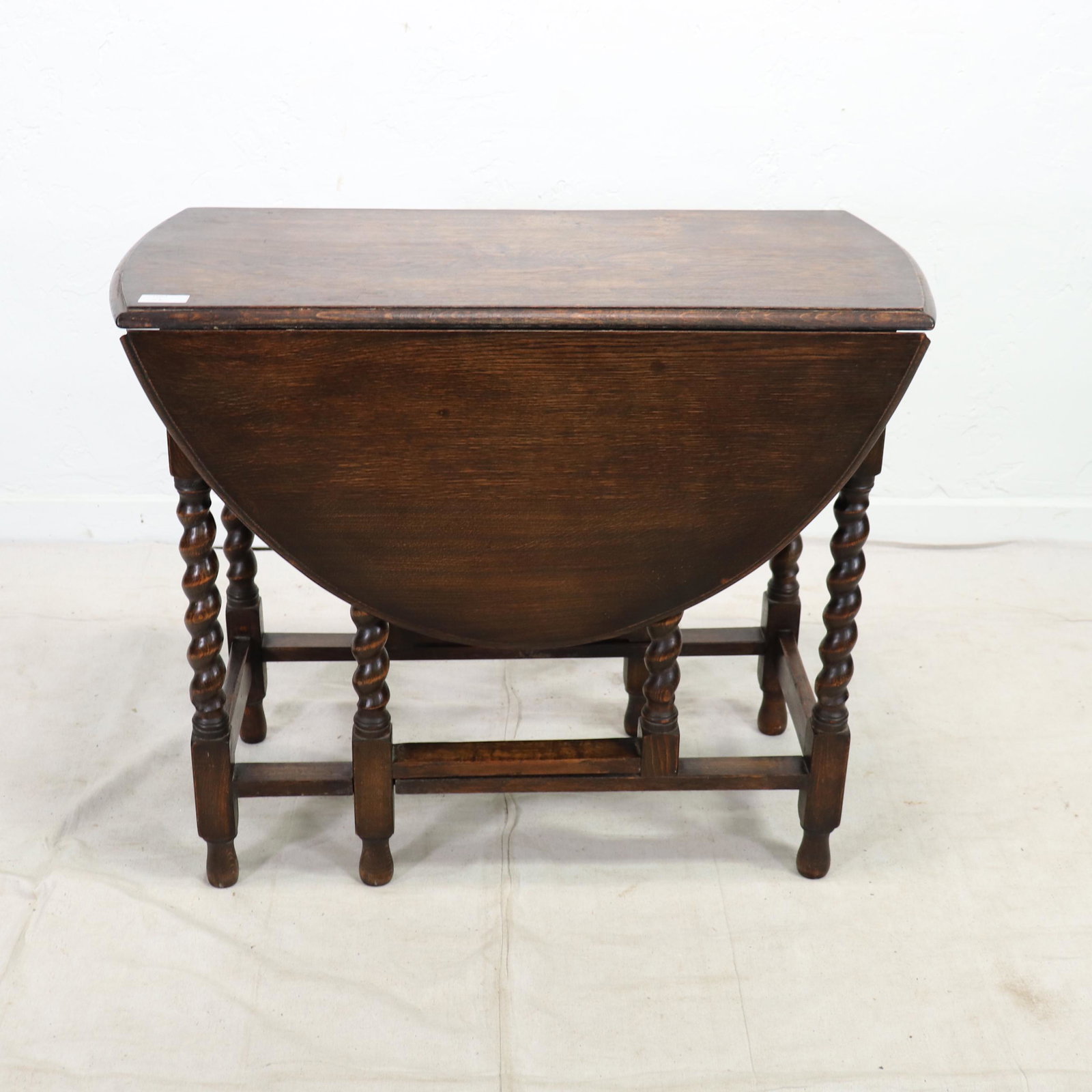 British Oak Drop Leaf Barley Twist Table: British Oak Drop Leaf Barley Twist Table 30 in tall x 50 x 37 when open.