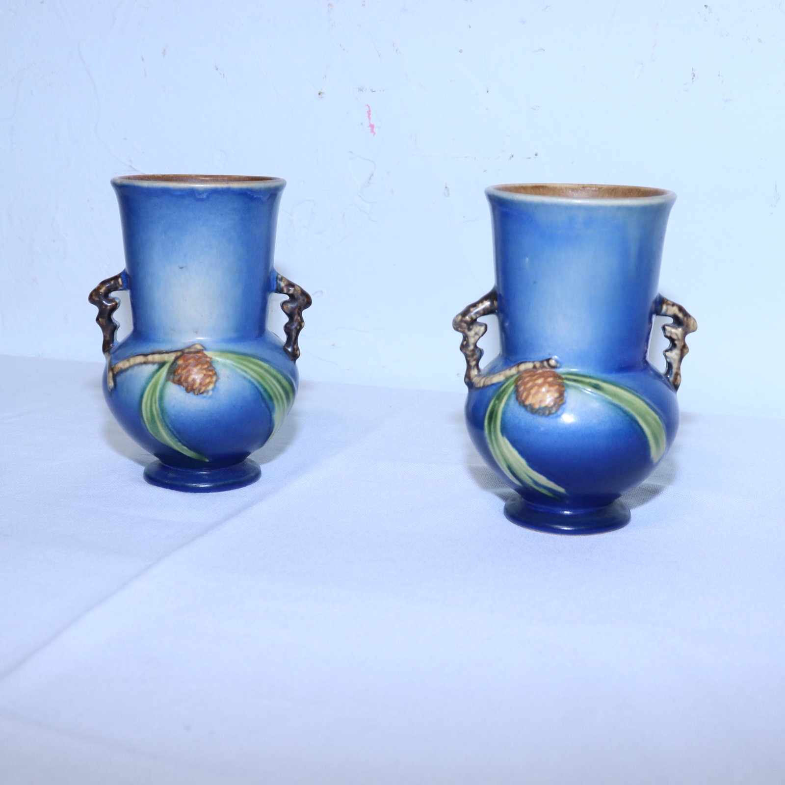 Pair Small Blue Roseville Vases With Pinecone Pattern (1 of 3)