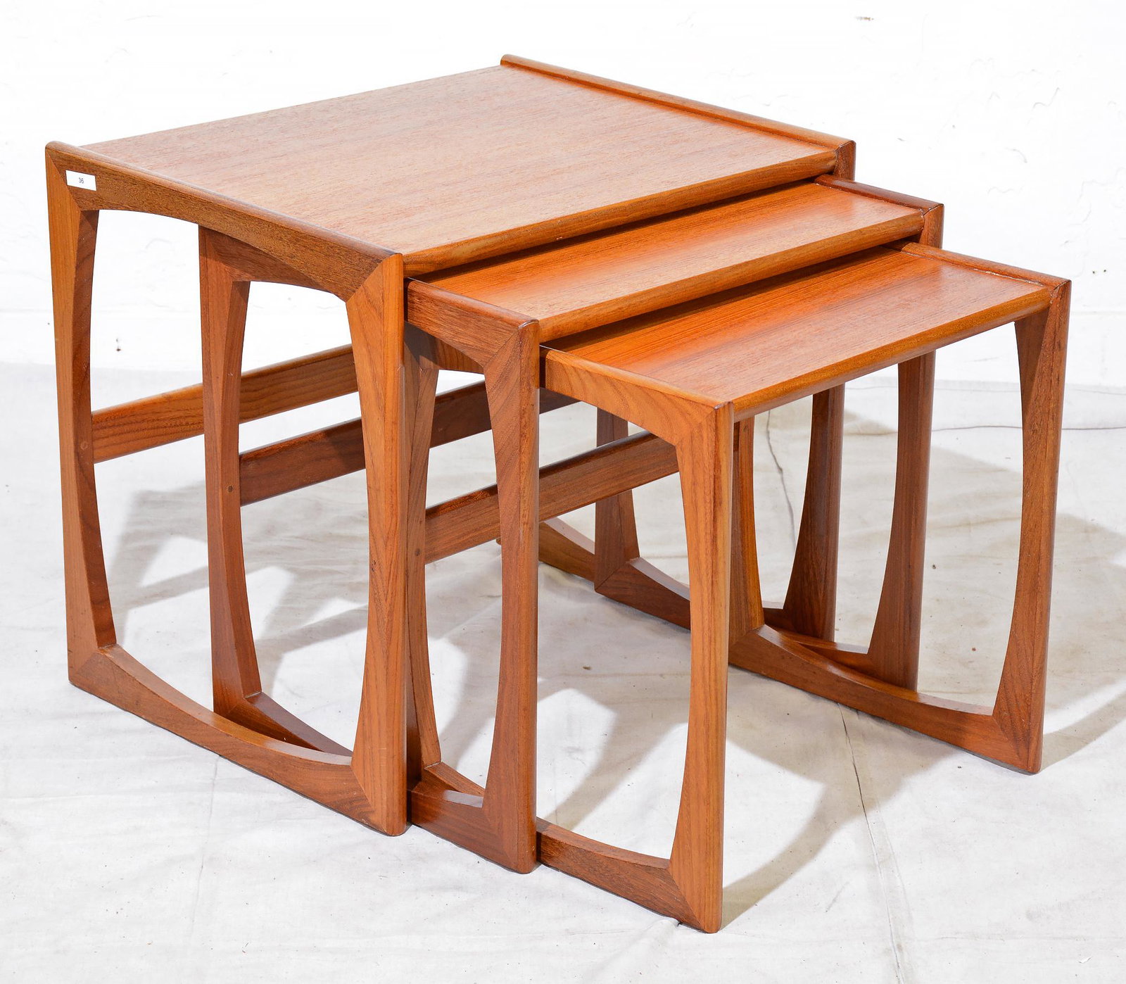 Mid Century Modern Quadrille Nest By G-plan #1: This Danish Modern Style Nest is British and made by Mid Century Modern Furniture Maker G Plan ( Gplan ) it stacks to make a bookcase as well. Measurement for largest table is 20in tall x 22 wide x 18