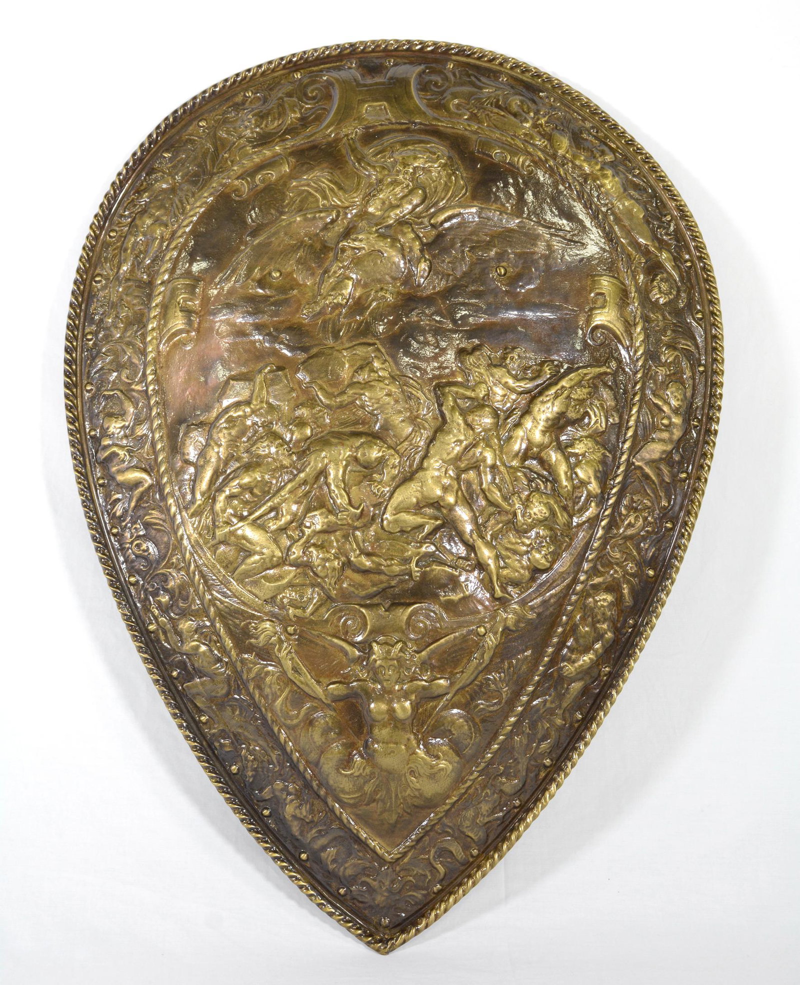 Embossed Vintage Brass Shield with God of Wind Motif: Embossed Vintage Brass Shield with God of Wind Motif - 30 in tall x 21