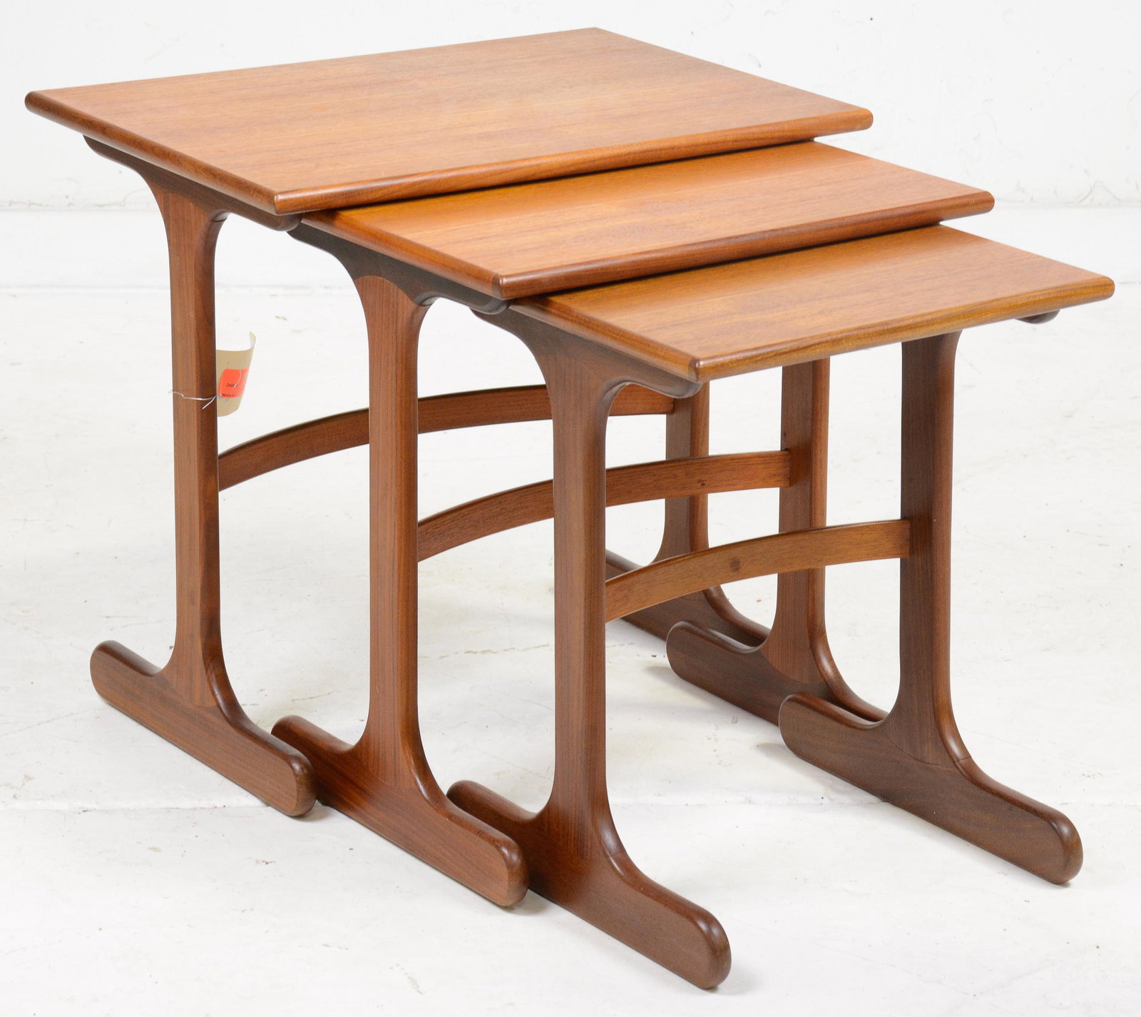 Mid Century Modern Gplan Nest of 3 Tables: This Danish Modern Style Teak Nest is made by Mid Century Modern Furniture Maker G Plan ( Gplan ). 21 in tall x 23 x 16