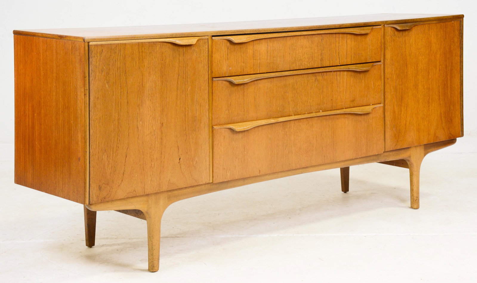 Mid Century Modern Teak Sideboard with folded handles: Danish Modern Style Teak Credenza with Folded Handles - Made in England by Sutcliffe - 31 in tall x 73 x 18