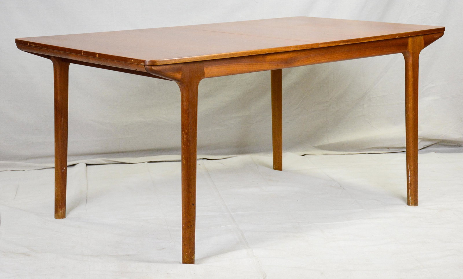 Mid Century Modern McIntosh Double Leaf Teak Table: Danish Modern Style Double Leaf Teak Dining Table by McIntosh 30 in tall x 63 x 36 when fully open. This Danish Modern Style table features two butterfly / pop out leaves which can be used individuall