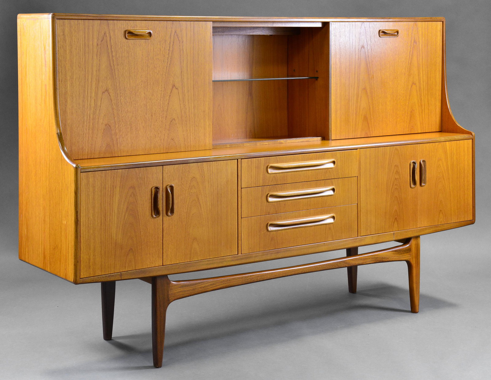 Mid Century Teak Cocktail Cabinet - Gplan - Fresco: This Danish Modern Style hutch / high board is British and made by Mid Century Modern Furniture Maker G Plan ( Gplan ) & is part of their "Fresco" Range. It has a drop down section with a glass shelf,