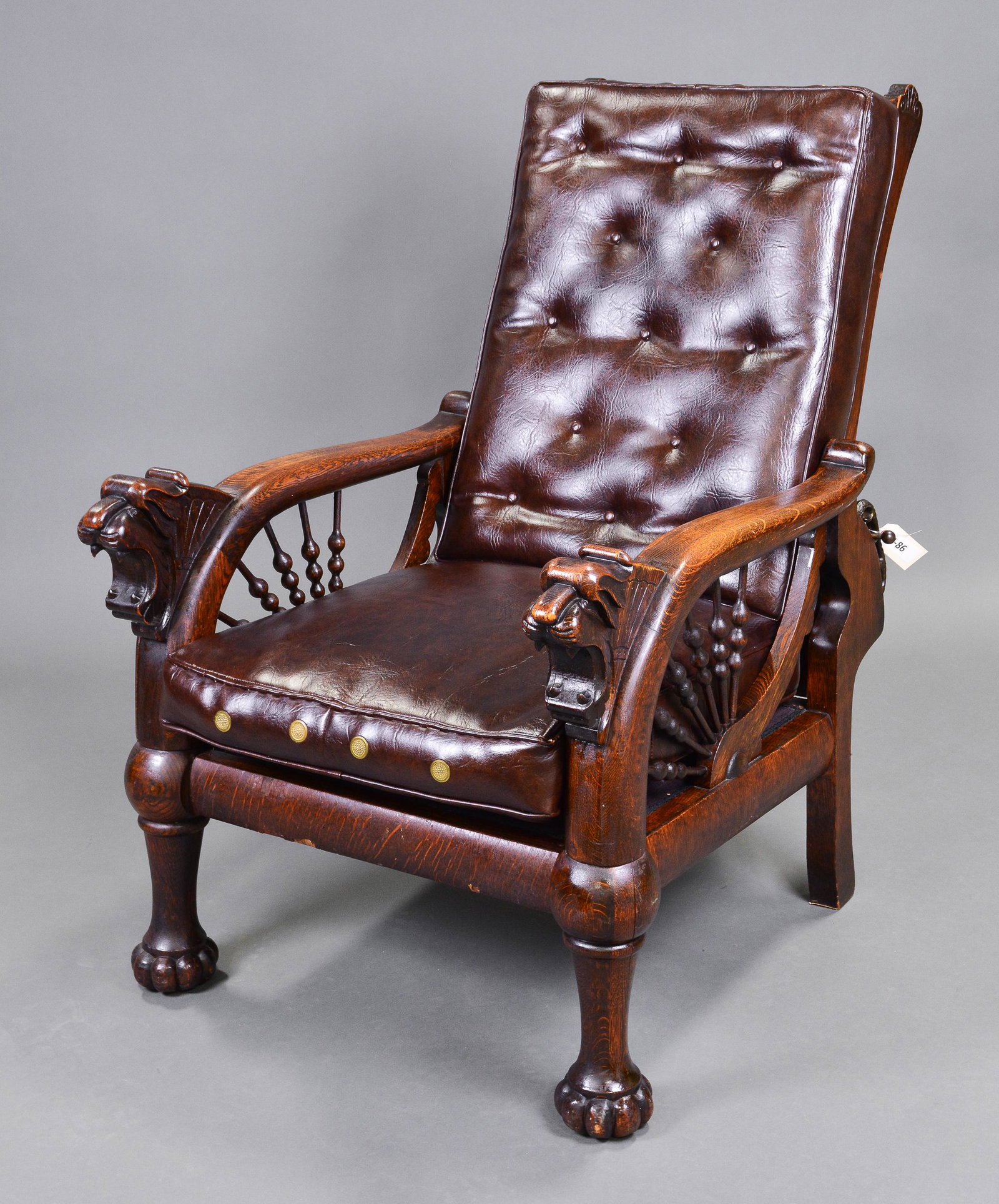 Griffin Carved Oak Button Tufted Leather Recliner: Griffin Carved Oak Button Tufted Leather Recliner - 41 in tall x 29 x 44