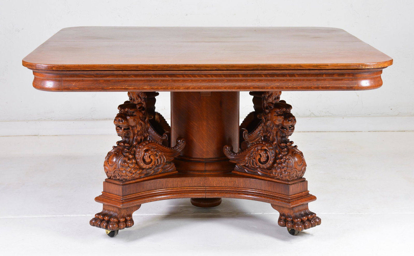 Victorian Renaissance Revival Oak Griffin Table: Antique Victorian Renaissances Revival Oak Extending Griffin Figural Carved Base Table with 6 Leaves c.1870 - 30 in tall x 54 x 54, 6 Leaves are 11 inches each. Fully extended this table will be 120 i