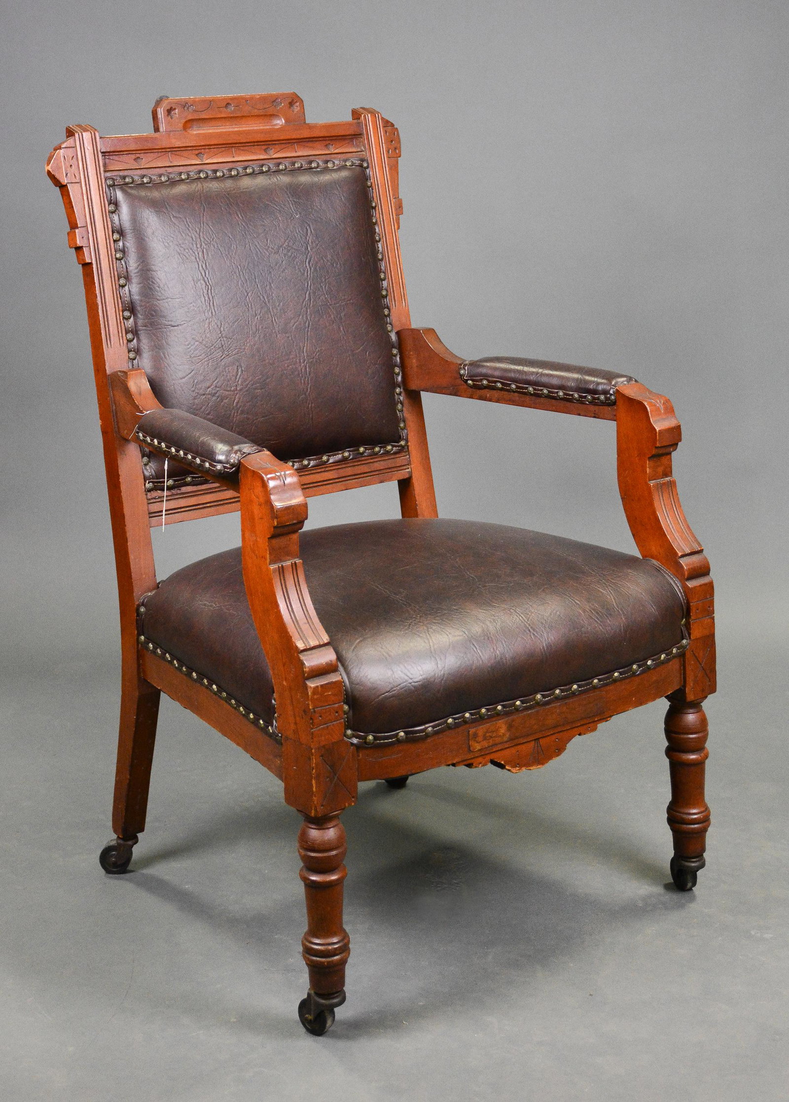 Eastlake Arm Chair With Leather Upholstery: Eastlake Arm Chair with Leather Upholstery - 40 in tall x 26 x 22