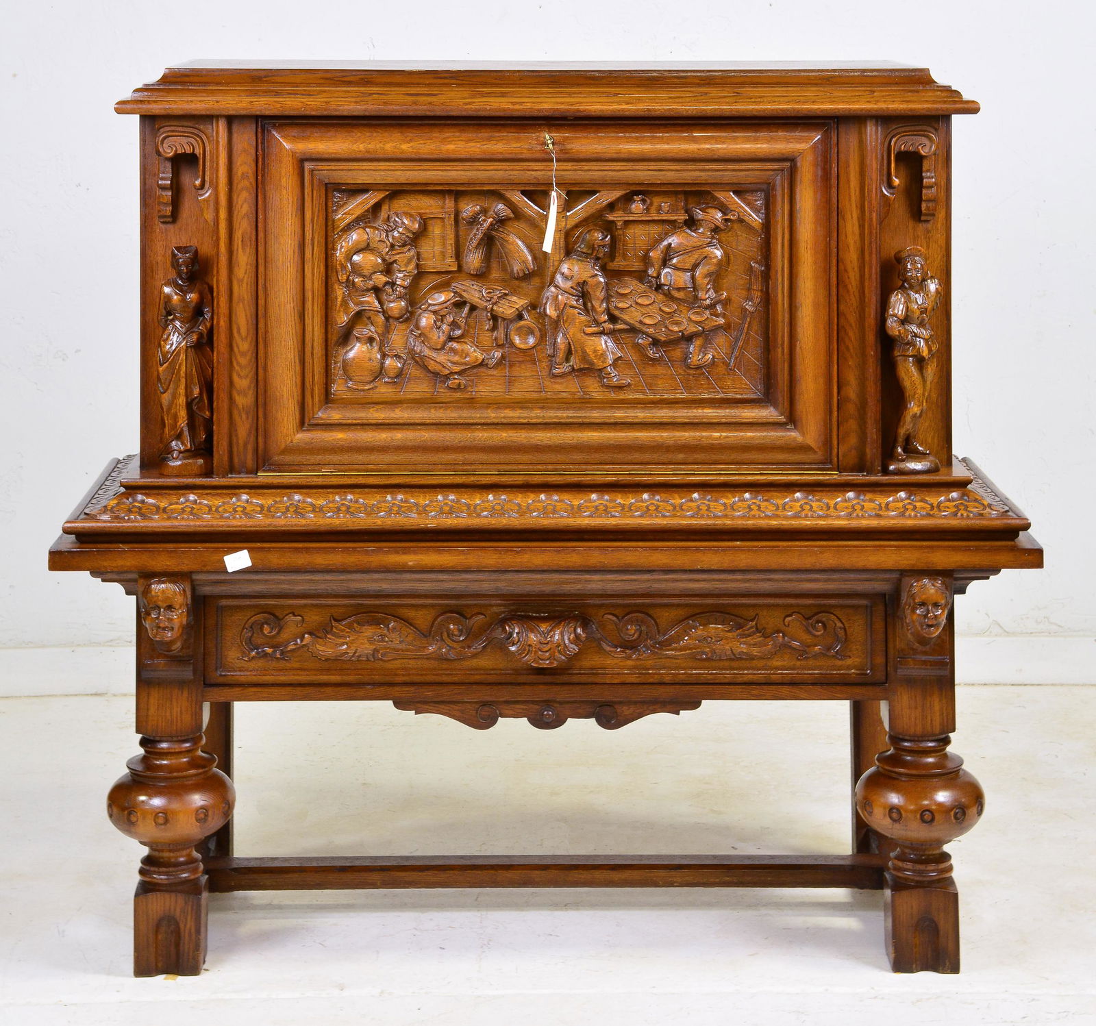 Carved Tudor Style Drop Front Bar Cabinet (1 of 5)