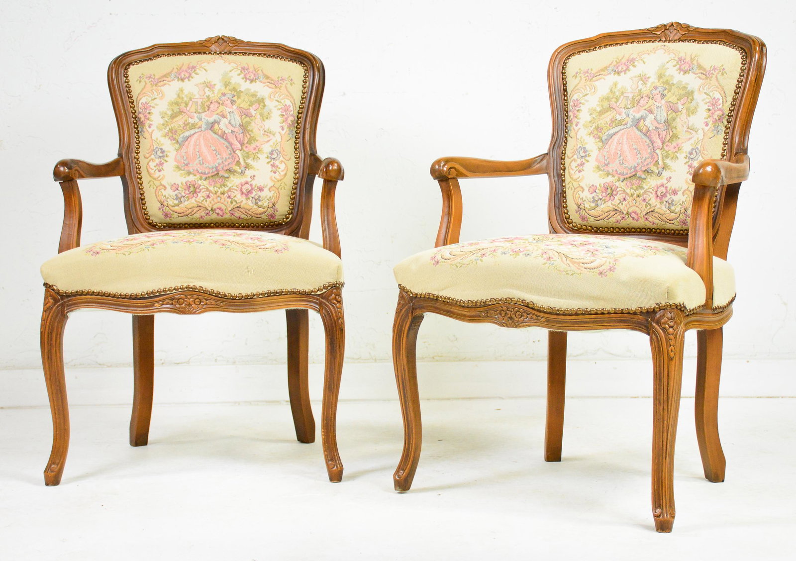 Pair French Style Upholstered Arm Chairs: Pair French Style Upholstered Arm Chairs - 33 in tall x 20 x 23 - This lot matches lot 219
