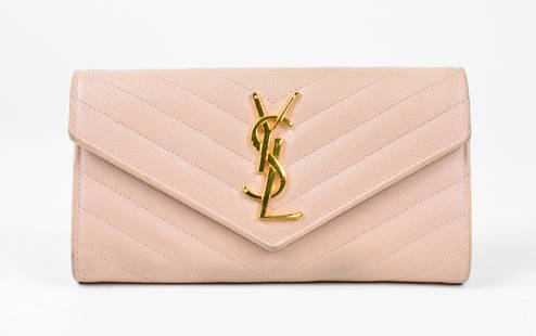 YSL Chevron Quilted Grained Leather flap wallet: Genuine Pre-Owned YSL Classic flap wallet in Salmon Pink Chevron Quilted Grained Leather in AB condition. Date Code is GUE372264-0718. Measurements: 19*11*3cm (Length * Height * Width). This lot inclu