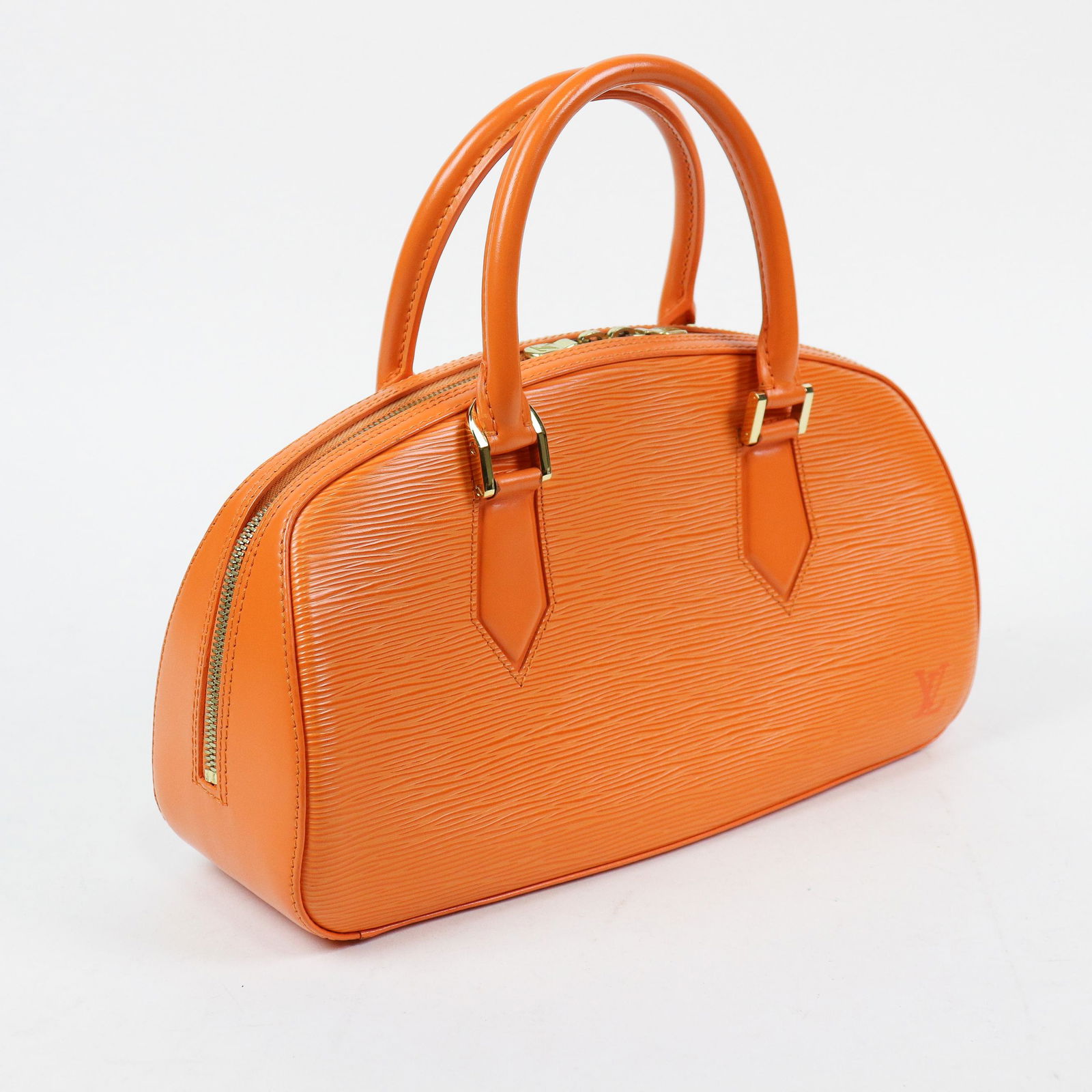 Louis Vuitton Jasmin in Epi: Genuine Pre-Owned Louis Vuitton Jasmin in Mandarin Orange Epi in A condition. Date Code is TH0014. Measurements: 32*18*9cm (Length * Height * Width). This lot includes a certificate of authenticity.
