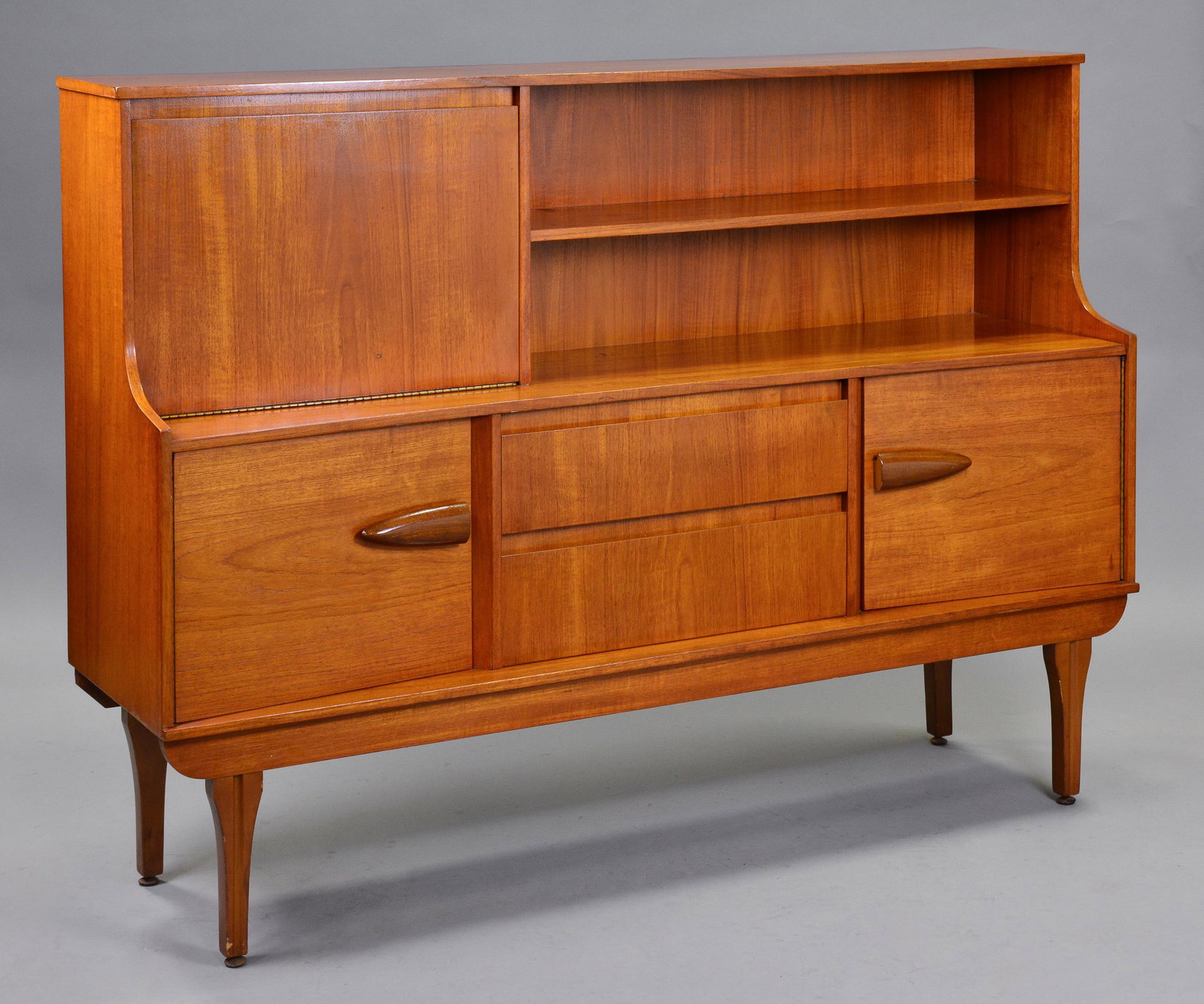 Mid Century Teak Cocktail Cabinet with Oval Handles: This Danish Modern Style Mid Century Teak Cocktail Cabinet with Oval Handles is British - 49 in tall x 67 x 18