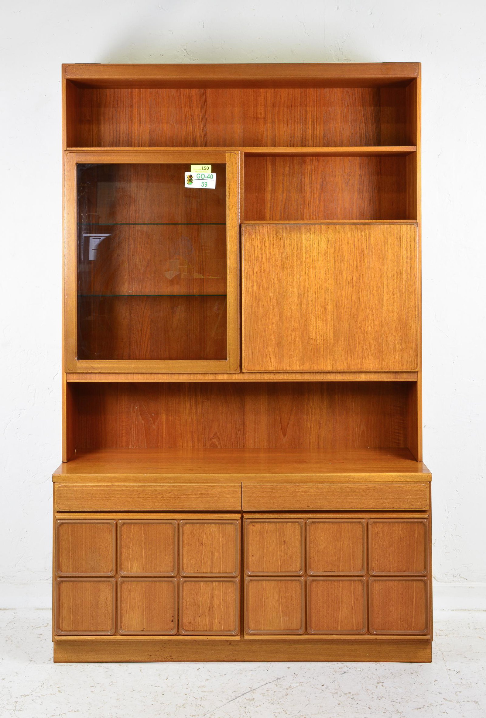Mid Century Glass Door Cocktail Cabinet - Nathan: Danish Modern Style Glass Door Cocktail Cabinet by Nathan Furniture Co - 76 in tall x 47 x 18 - This lot will connect with lots 145-151