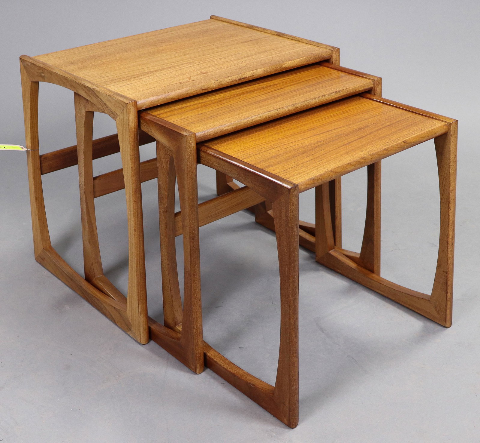 Mid Century Modern Quadrille Nest By G-plan: This Danish Modern Style Nest is British and made by Mid Century Modern Furniture Maker G Plan ( Gplan ) it stacks to make a bookcase as well. Measurement for largest table is 20 in tall x 22 wide x 1