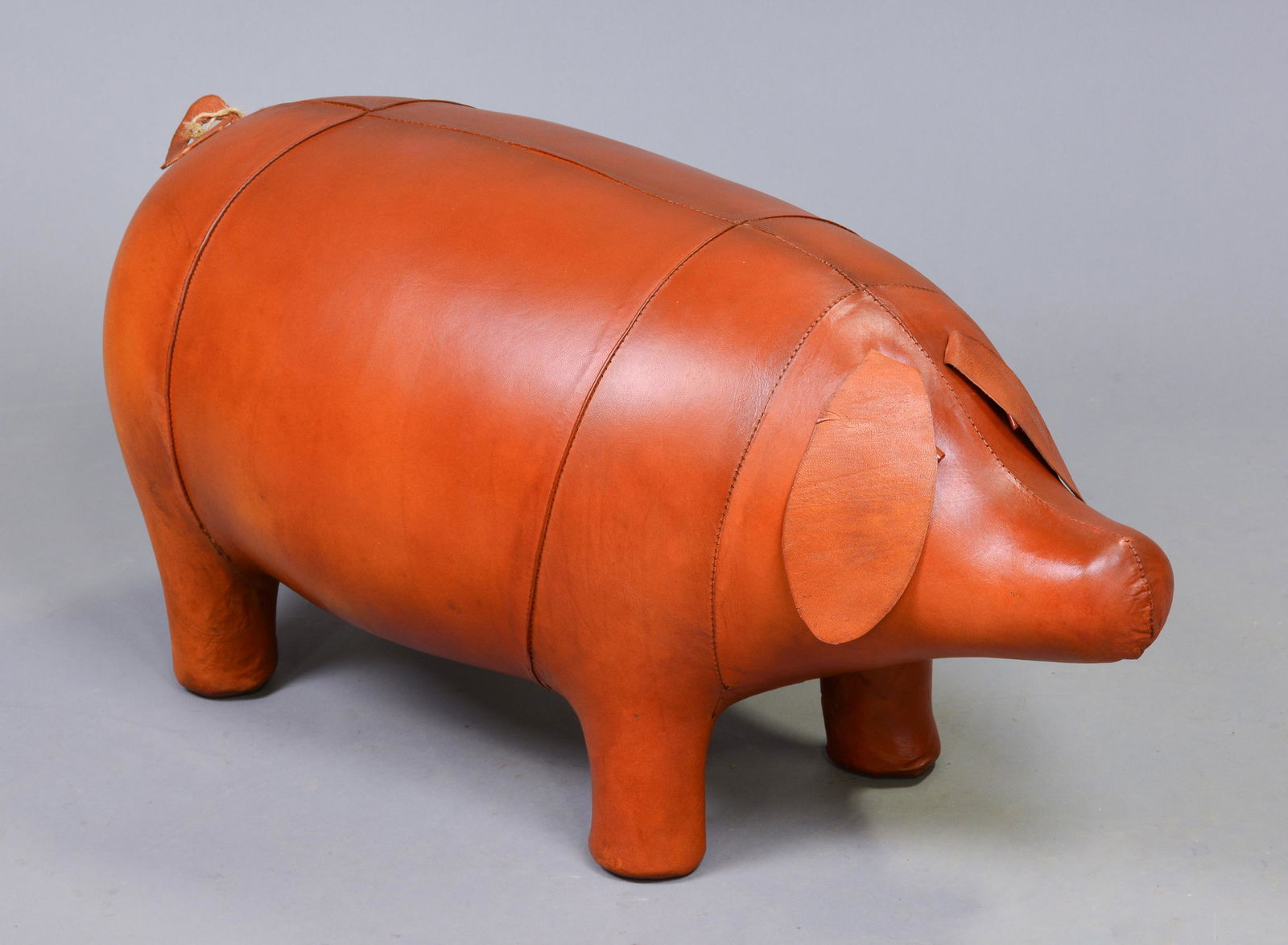 Leather Pig Foot Stool in the manner of Omersa (1 of 2)