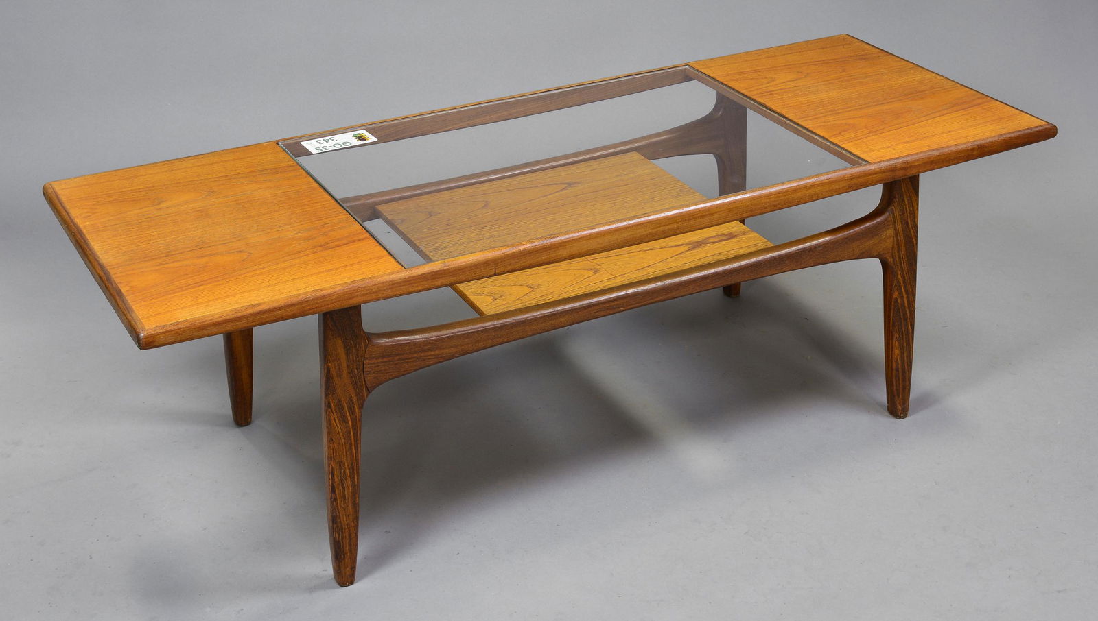 G-Plan Fresco Coffee Table as seen in Mad Men: This Danish Modern Style teak coffee table is British and made by British Mid Century Modern Furniture Maker G Plan (GPlan). This model table was featured in the Mid Century Modern office of Don Drape