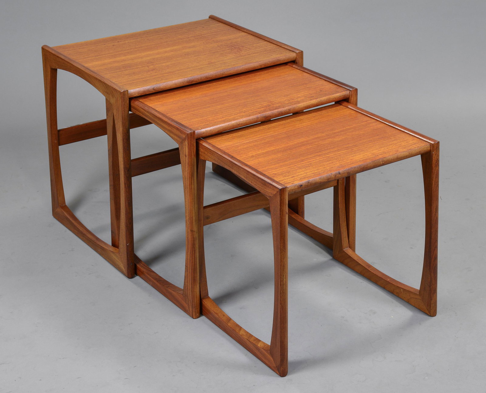 Mid Century Modern Quadrille Nest By G-plan #2: This Danish Modern Style Nest is British and made by Mid Century Modern Furniture Maker G Plan ( Gplan ) it stacks to make a bookcase as well. Measurement for largest table is 19 in tall x 21 wide x 1
