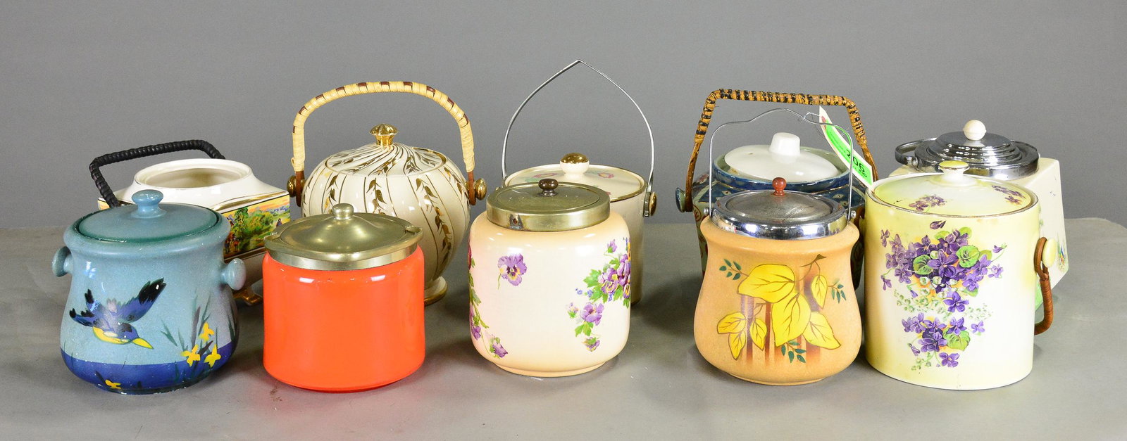 11 Assorted Porcelaine Biscuit Barrels: 11 Assorted Porcelaine Biscuit Barrels - Largest is 7 in tall x 8 inch diameter