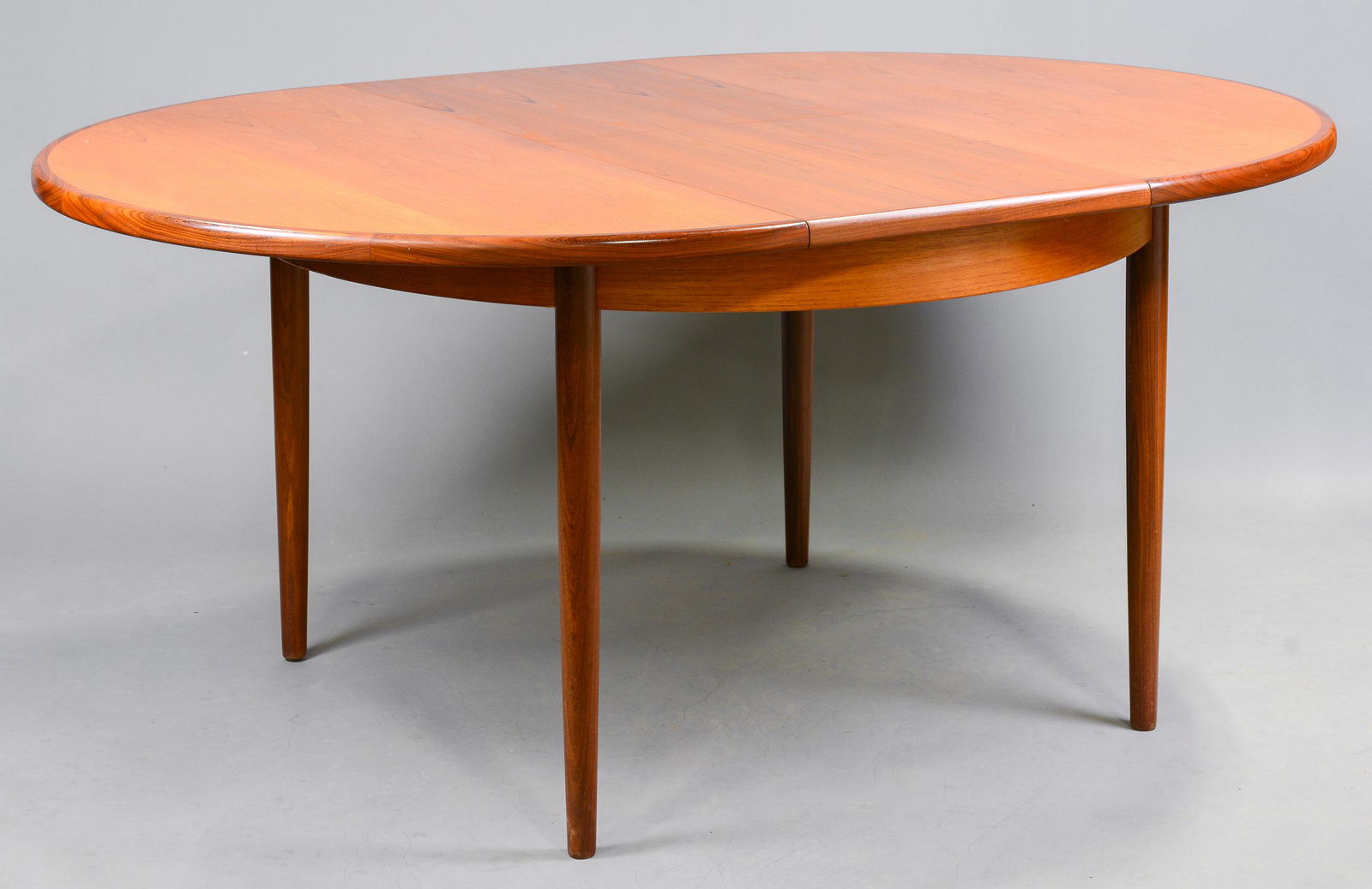 Round Mid Century Dining Table By G-Plan - Pop Up Leaf: This Danish Modern Style Teak Dining Table includes a pop-out butterfly style leaf & is made by Mid Century Modern Furniture Maker G Plan ( Gplan ) - Part of their Fresco Range. 29 in tall x 48 in lon