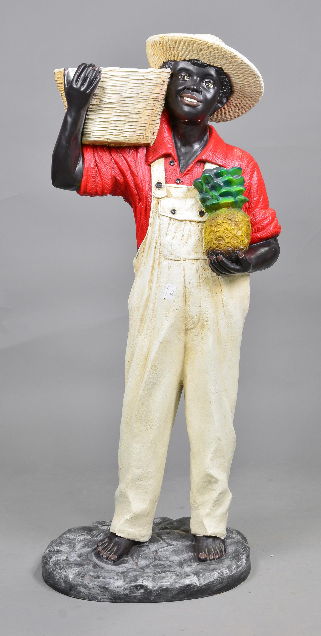 Tall Figure Of Boy Holding A Pinapple (1 of 2)