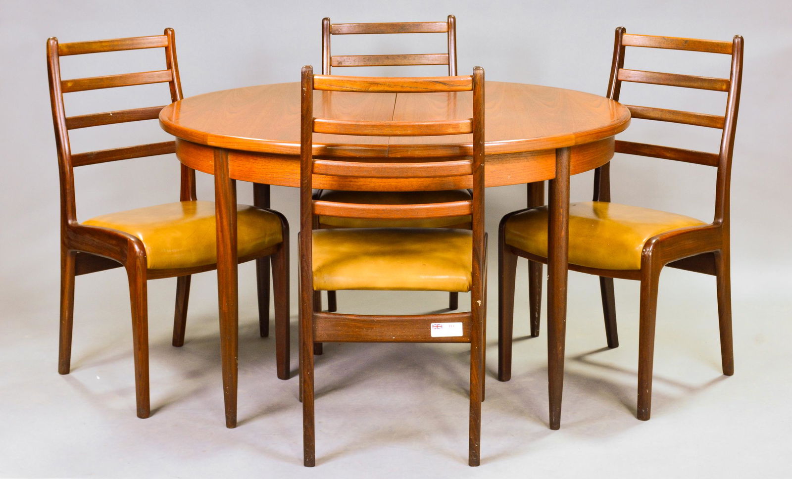 Round Mid Century Dining Table By G-Plan & 4 Chairs: This Danish Modern Style Teak Dining Table includes a pop-out butterfly style leaf & is made by Mid Century Modern Furniture Maker G Plan ( Gplan ) - Part of their Fresco Range. 29 in tall x 48 in lon