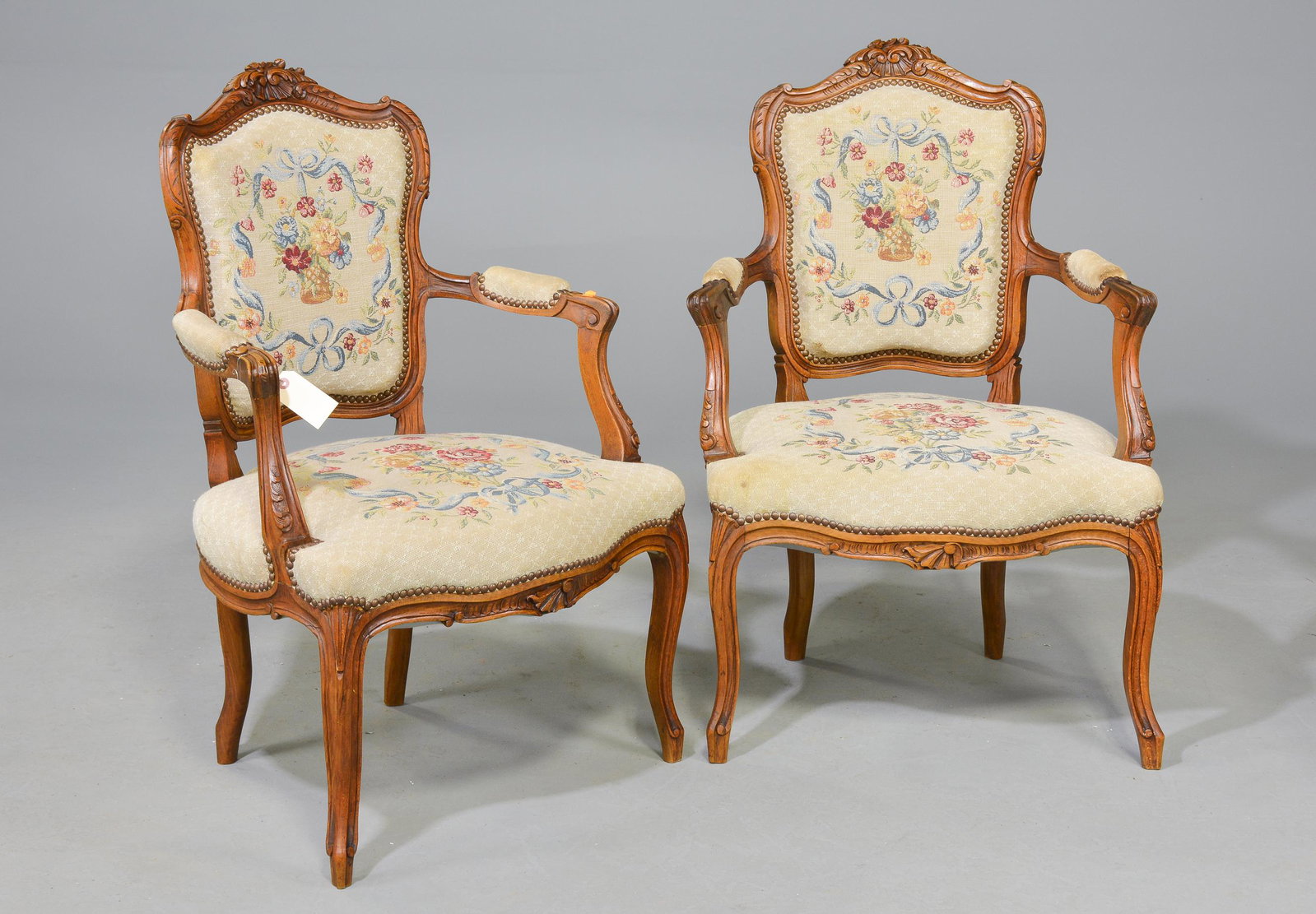 Louis XV Style Pair of Upholstered Arm Chairs: French Louis XV Style Pair of Floral Upholstered Arm Chairs - 37 in tall x 25 x 23, Seat height is 16 inches, Seat depth is 19 inches