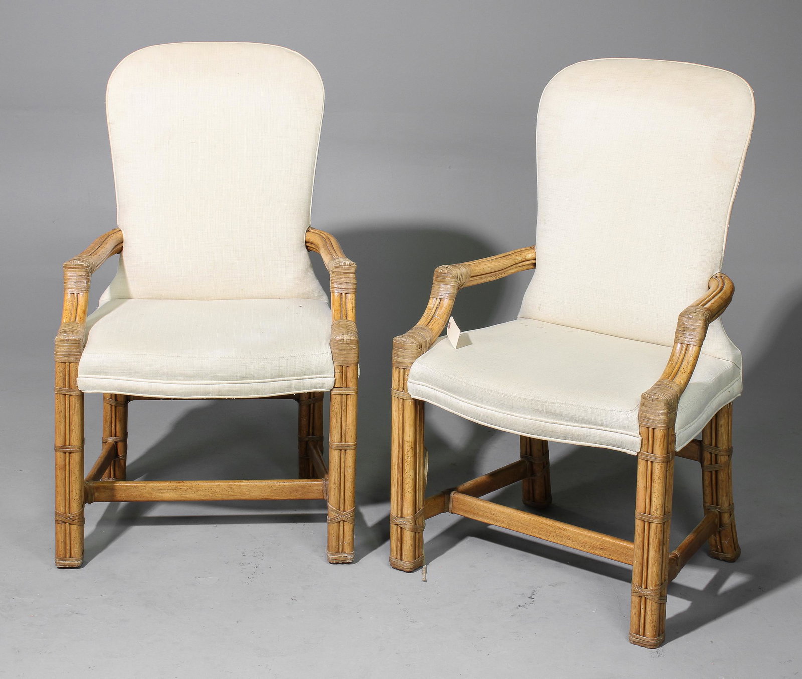 Pair of Upholstered Bamboo Arm Chairs: Pair of Upholstered Bamboo Arm Chairs - 41 in tall x 24 x 19