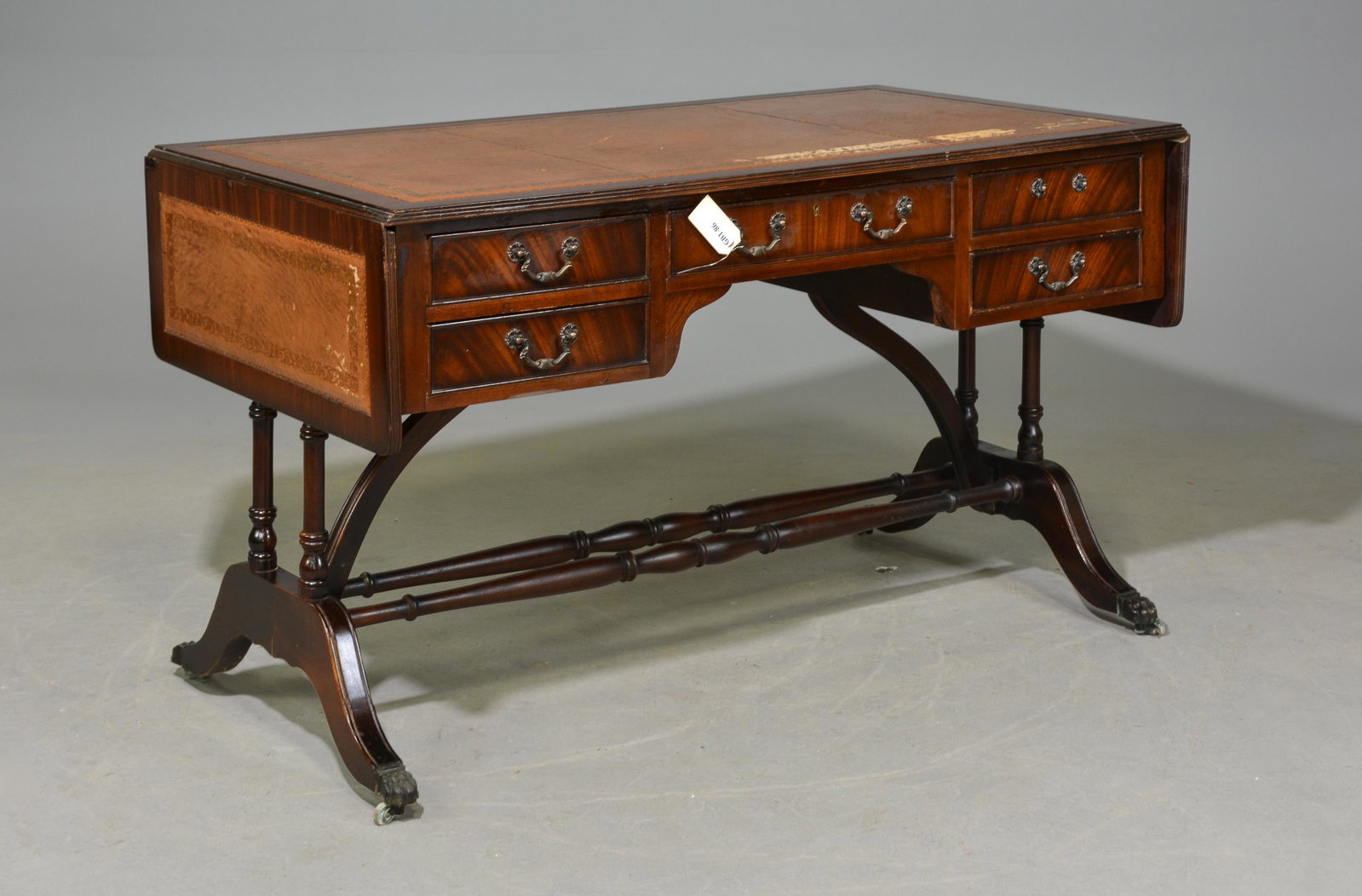 English Mahogany Leather Top Drop Side Desk: English Mahogany Leather Top Drop Side Desk - 31 in tall x 55 x 28, Leaves are 12 inches each