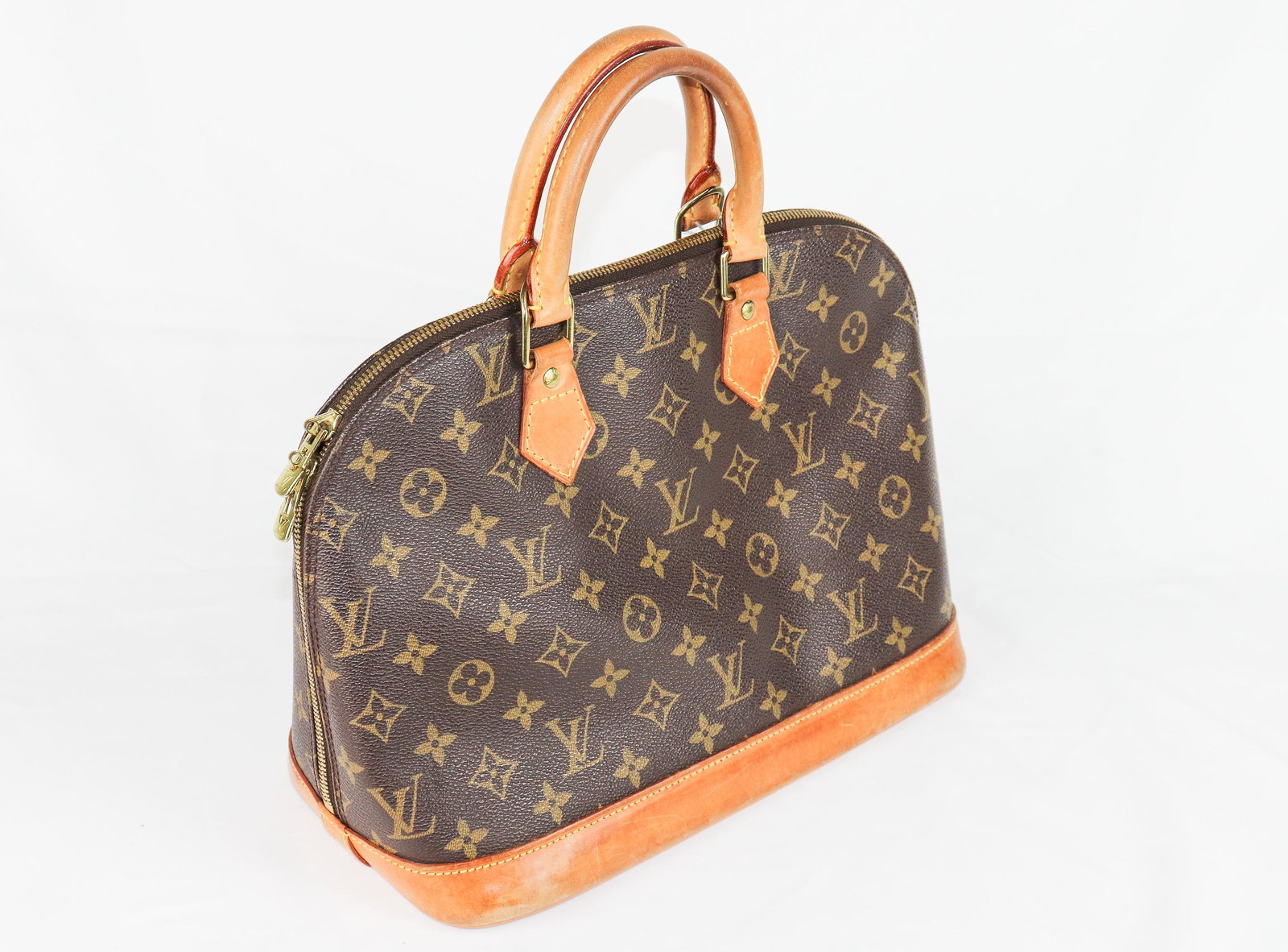 Louis Vuitton Alma PM in Brown Monogram Canvas (1 of 6)