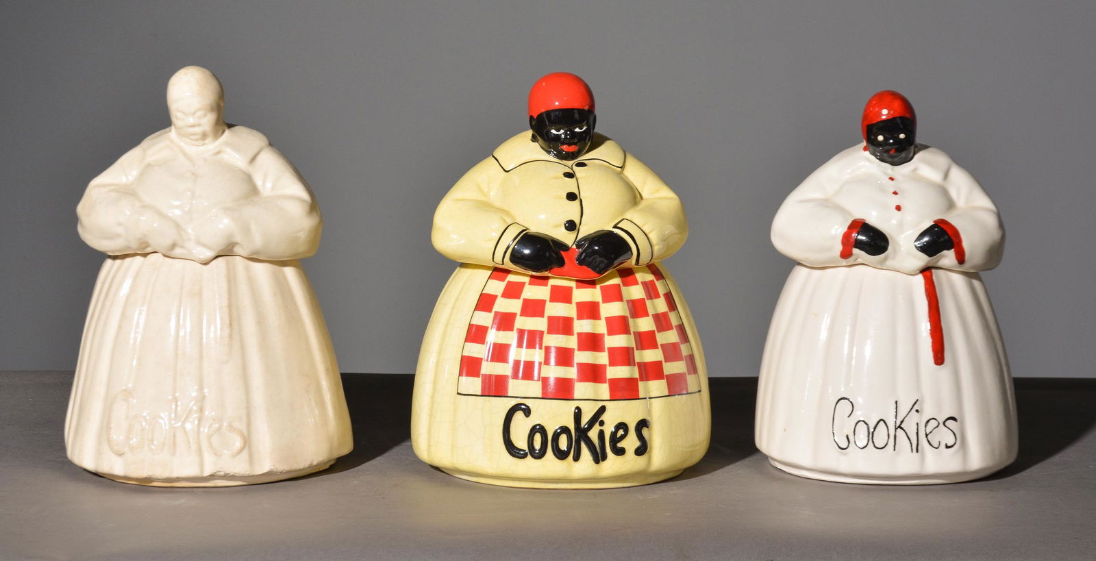 3 Assorted Mammy Cookie Jars - McCoy: 3 Assorted Mammy Cookie Jars - 2 are signed McCoy - 11 in tall x 8 x 8
