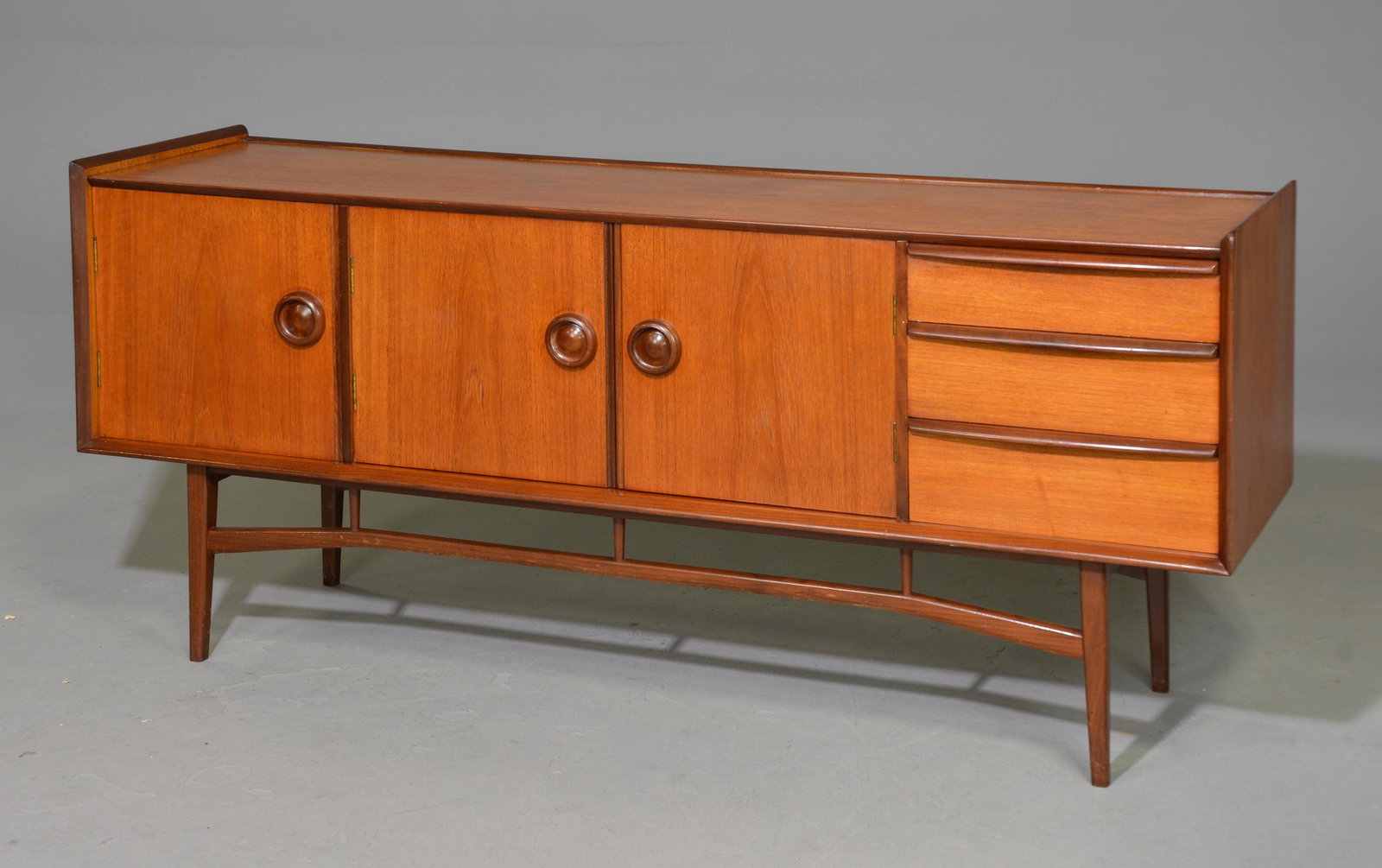 Mid Century Modern Sideboard with Open Stretcher Base: Mid Century Modern Sideboard with Open Stretcher Base - 29 in tall x 66 x 17