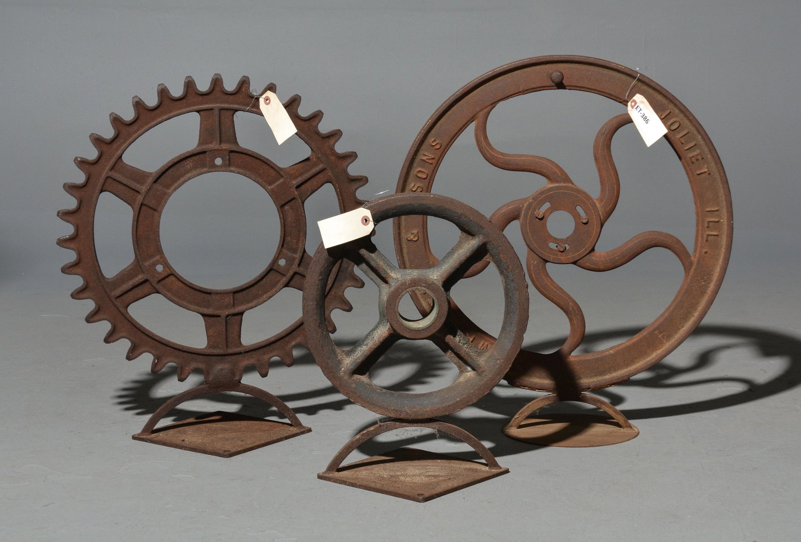 3 Cast Iron Wheels on Stands (1 of 4)