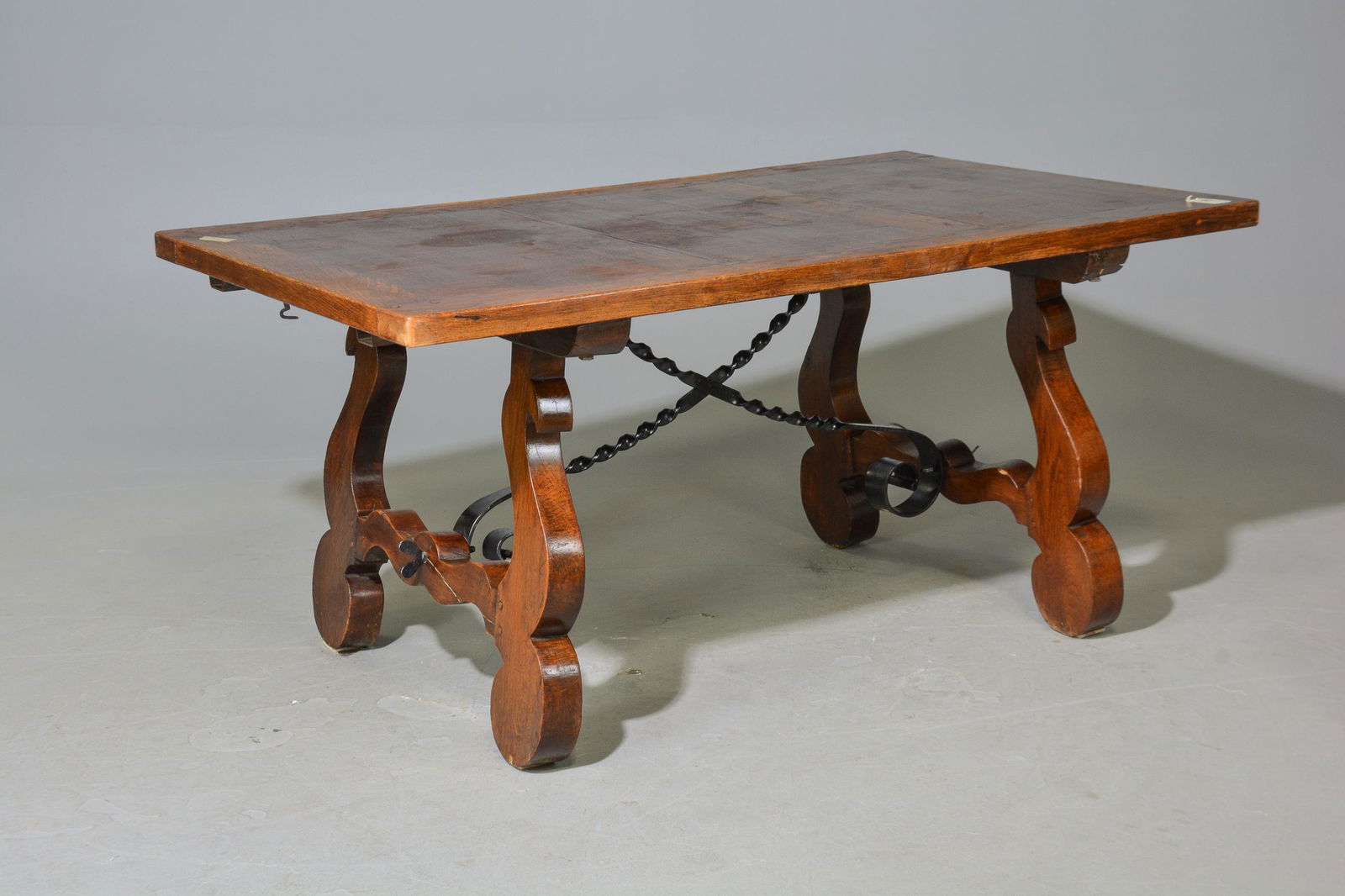 Spanish Style Iron Stretcher Base Oak Table (1 of 6)