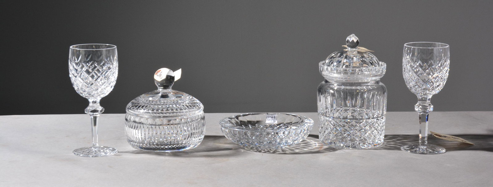 5pcs Assorted Waterford Crystal: 5pcs Assorted Waterford Crystal - Wine stems, 2 candy dishes and 1 ash tray - Stems are 8 in tall x 3 inch diameter, Largest candy dish is 8 in tall x 6 inch diameter, smaller is 6 in tall x 6 inch di
