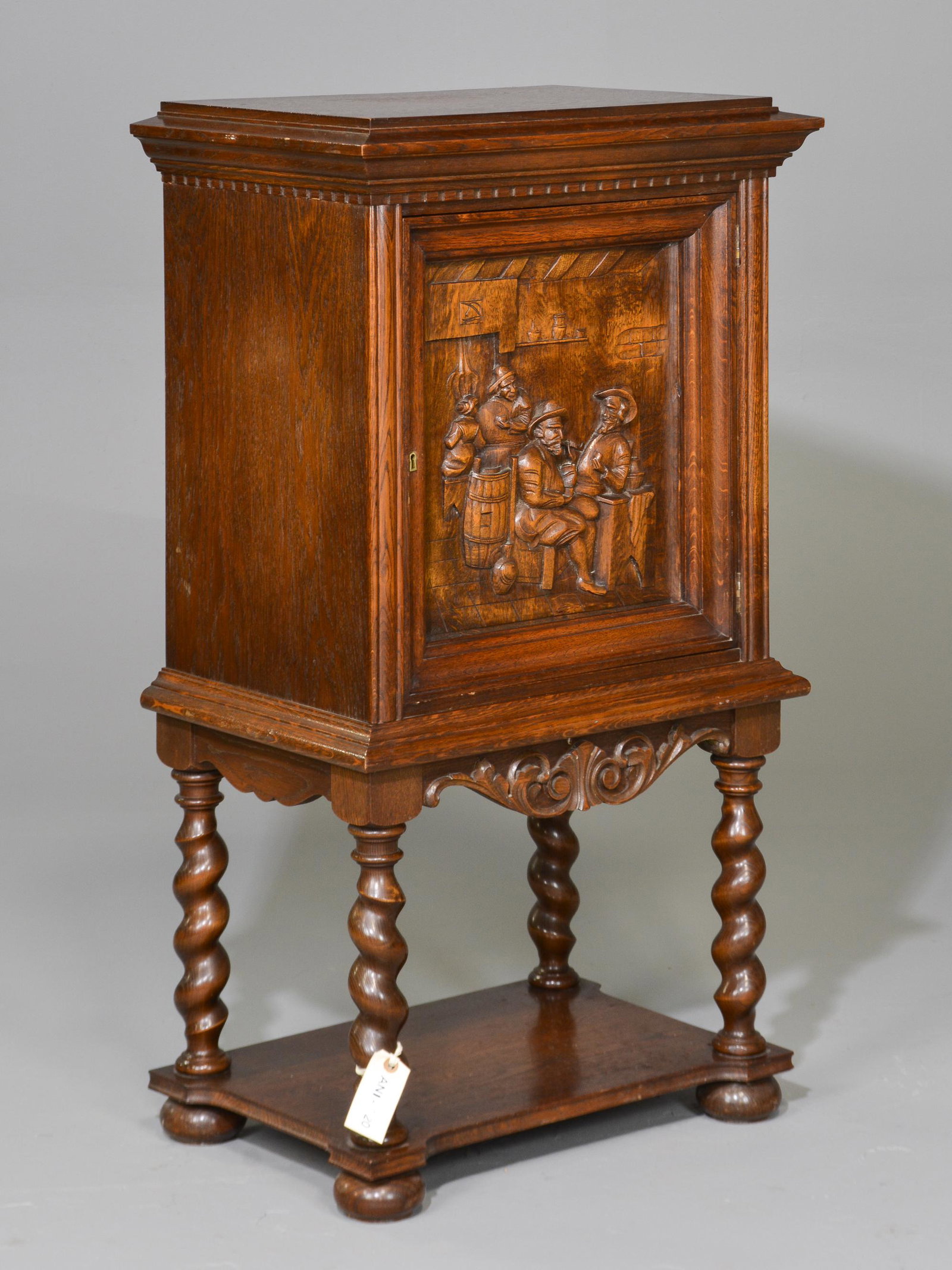 Breton Style Oak Barley Twist Cabinet: Breton Style Oak Barley Twist Cabinet with Figural Carved Relief Door - 42 in tall x 24 x 16