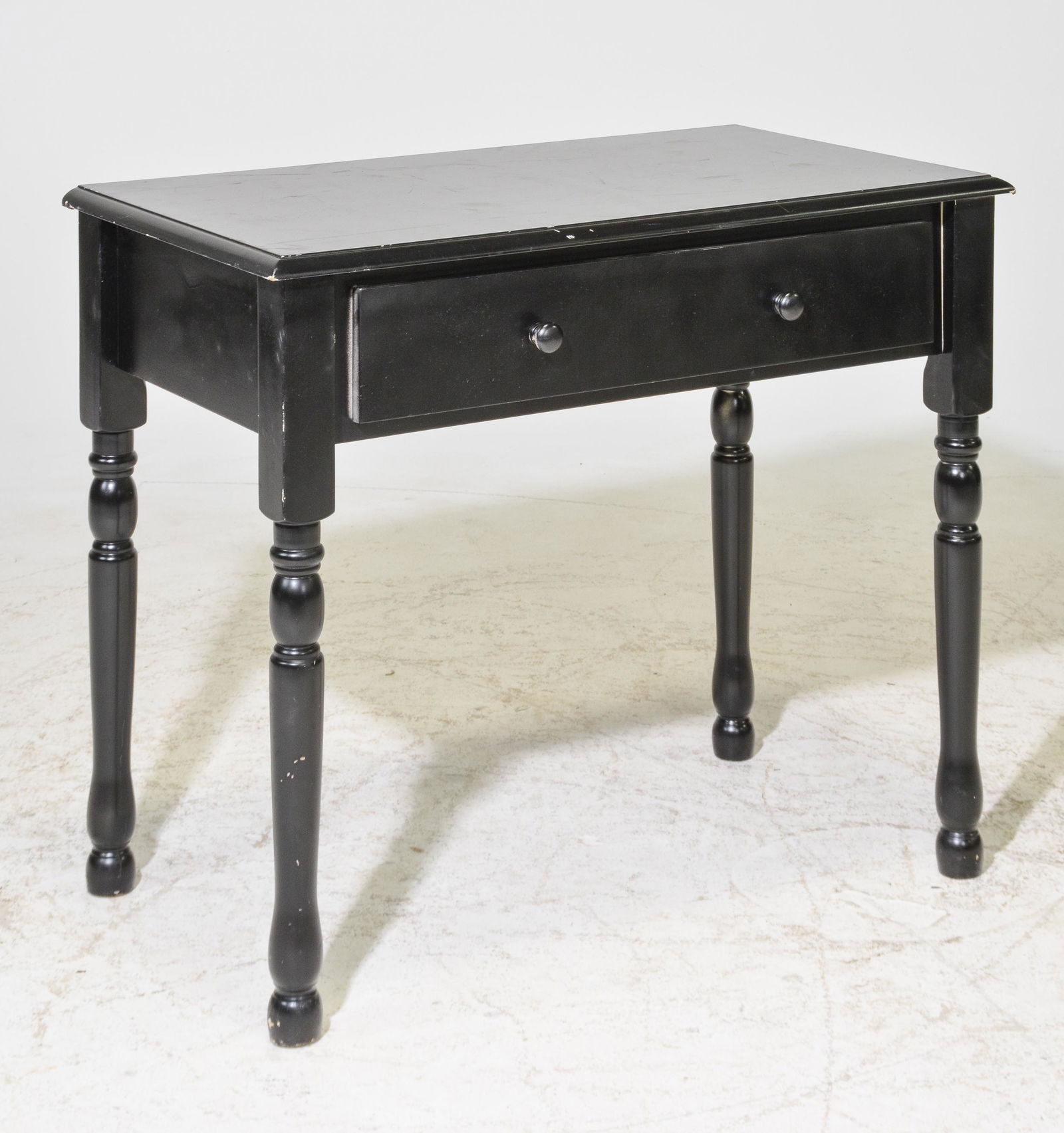 Black Painted Side Table With a Drawer: Black Painted Side Table With a Drawer -- 29 in tall x 35 x 20