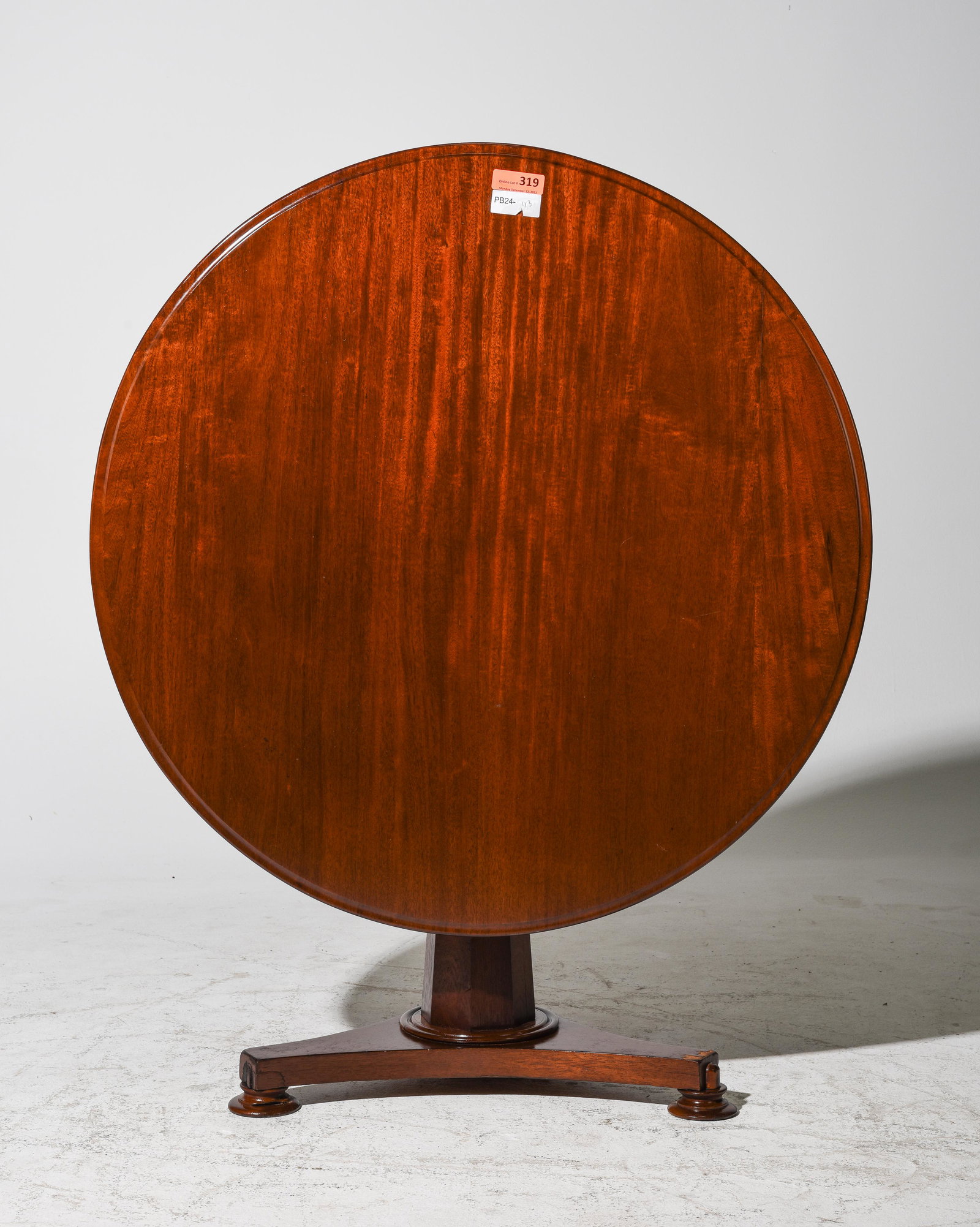 Mahogany Tilt Top Table: Mahogany Tilt Top Table - 50 in tall x 40 x 22 when tilted and 26 in tall x 40 inch diameter when down