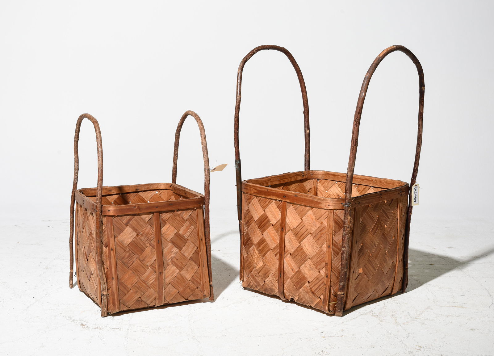 2 Woven Baskets with Branch Handles (1 of 4)
