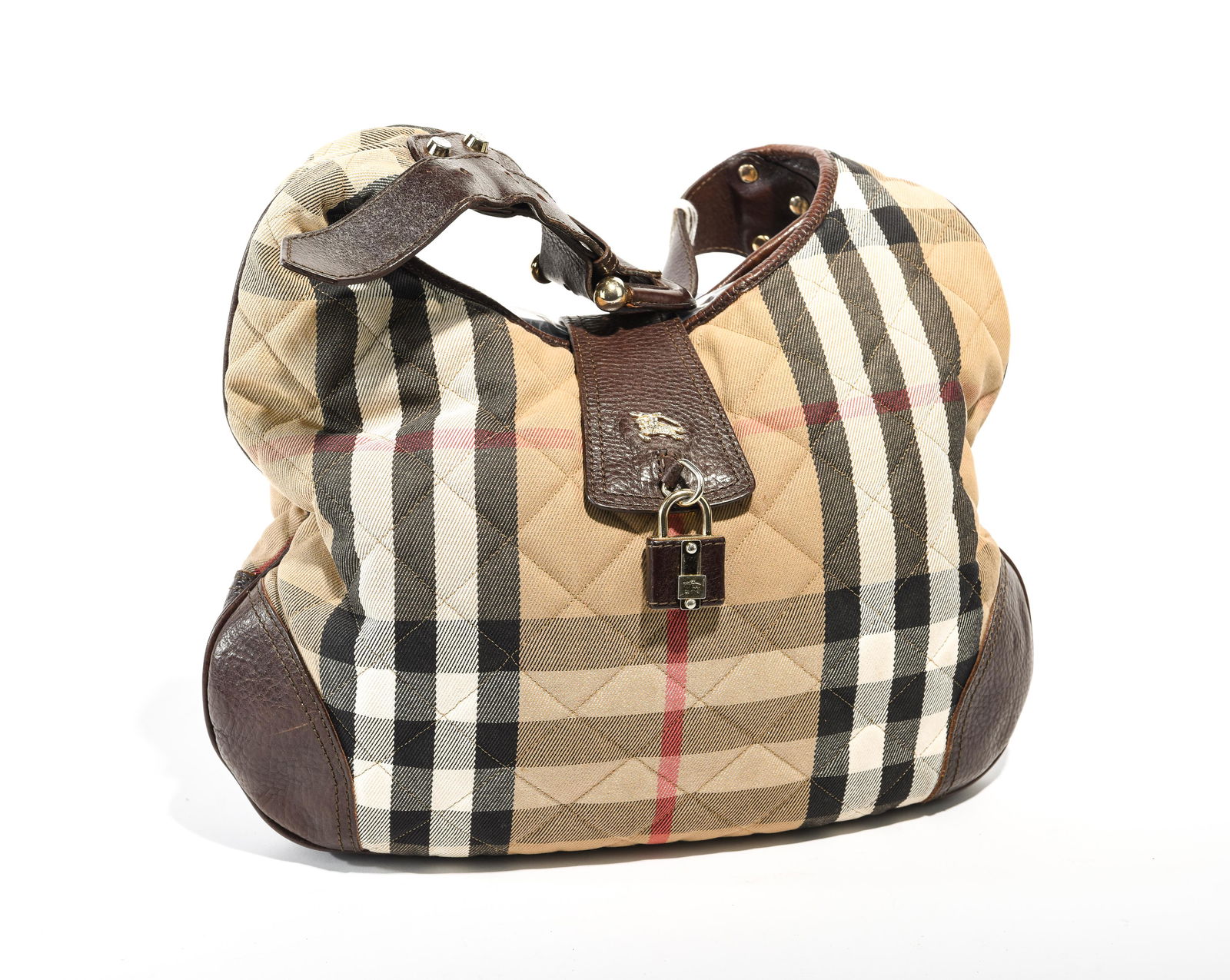 Burberry Hobo in Biege/Brown Quilted Checked Canvas: Genuine Pre-Owned Burberry Hobo in Biege/Brown Quilted Checked Canvas in A condition. Date Code is ITTIVGRO58CAL This lot includes the following accessories: lock & key, dust bag. Measurement: 39 x 2
