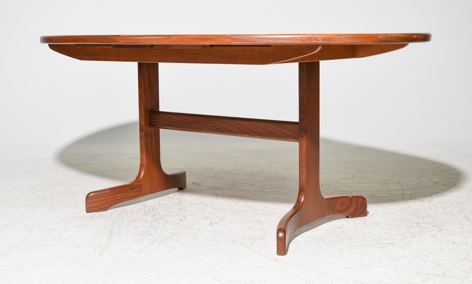 Oval Mid Century Teak Dining Table By G-Plan: This Danish Modern Style Teak Dining Table includes a pop-out butterfly style leaf & is made by Mid Century Modern Furniture Maker G Plan ( Gplan ), part of their fresco range . - 30 in tall x 65 x 43