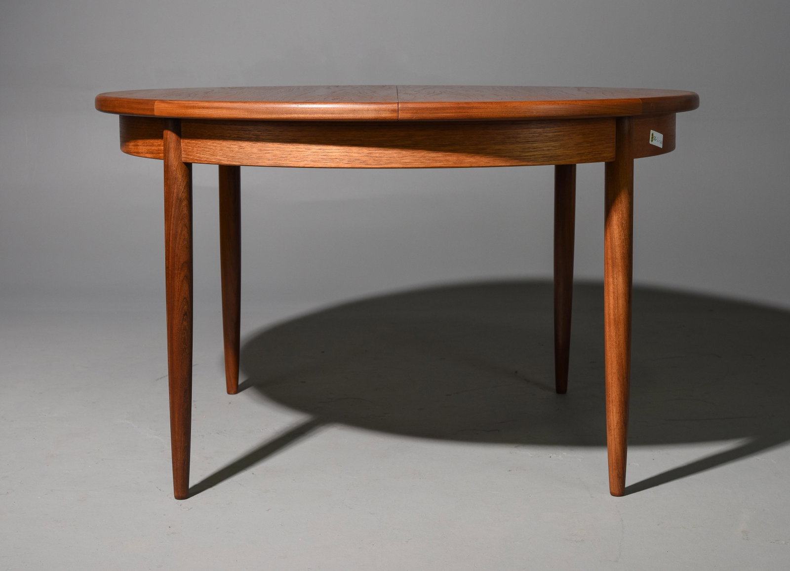 Round Mid Century Table By G-Plan - Pop Up Leaf: This Danish Modern Style Teak Dining Table includes a pop-out butterfly style leaf & is made by Mid Century Modern Furniture Maker G Plan ( Gplan ) - Part of their Fresco Range. - 30 in tall x 48 inch