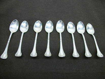 Pesa Mexican Sterling Flatware Service: A 40 Piece Partial Service; All Pcs. stamped Sterling Pesa Mexico, all pieces have a crossed ribbon design at mid handle and a scroll design at the end of the handle; includes 9 Dinner Forks, 4 Salad/