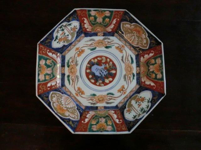 Good Ant. Octagonal Imari Charger: Late 19th C., the 8 sided shape having a paneled decoration design of flowers in Vibrant Blues, Greens and Orange with Gold Accents; Painted on front and Back; 11.5 inches wide